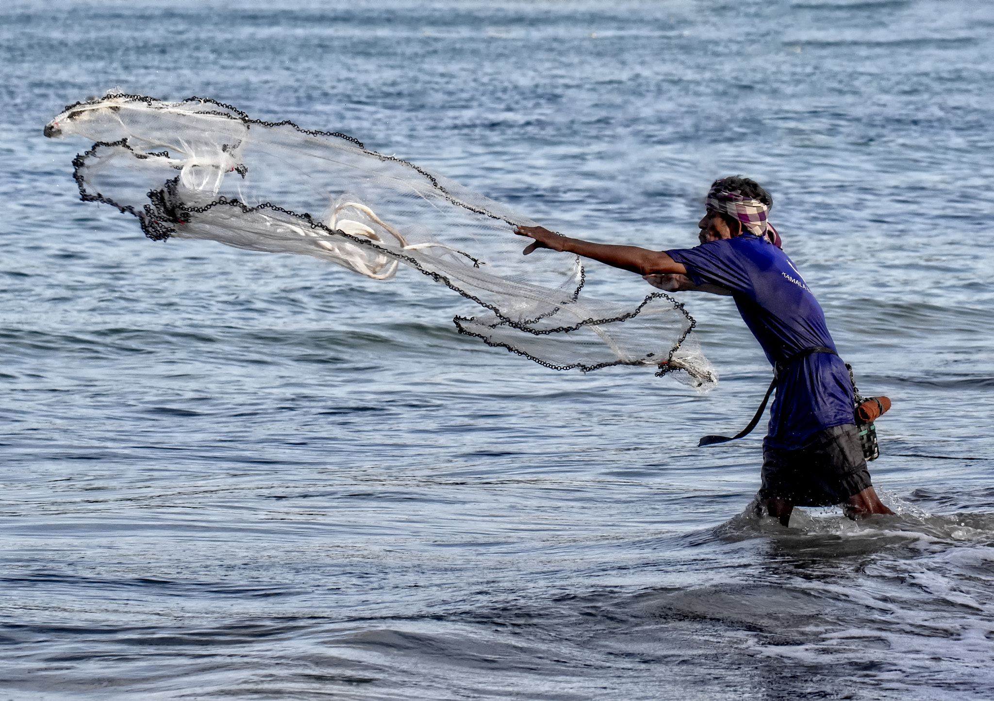 Canon EOS 7D Mark II sample photo. Local fisherman throwing his net photography