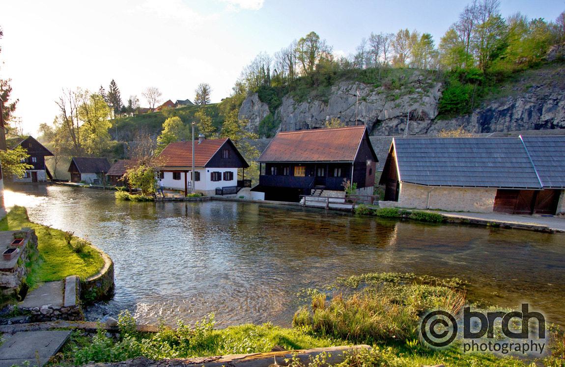 Canon EOS 550D (EOS Rebel T2i / EOS Kiss X4) + Canon EF-S 10-22mm F3.5-4.5 USM sample photo. Falling waters village of rastoke photography