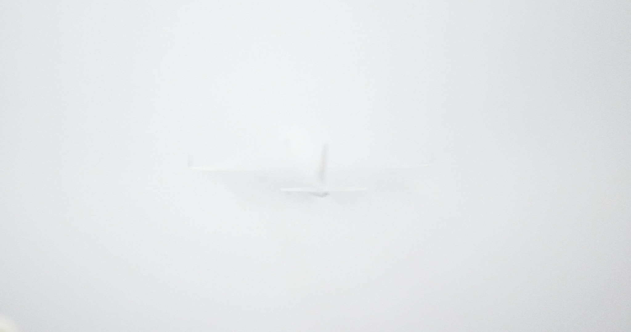 Olympus OM-D E-M1 sample photo. 13/5000 the plane in the fog photography