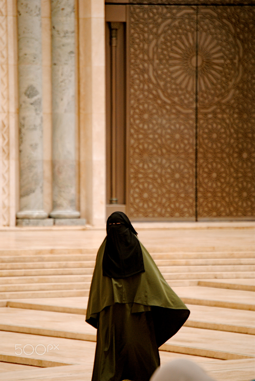 Nikon D3000 + Nikon AF-S DX Nikkor 55-200mm F4-5.6G ED sample photo. A lady with burka by the big mosque of casablanca photography