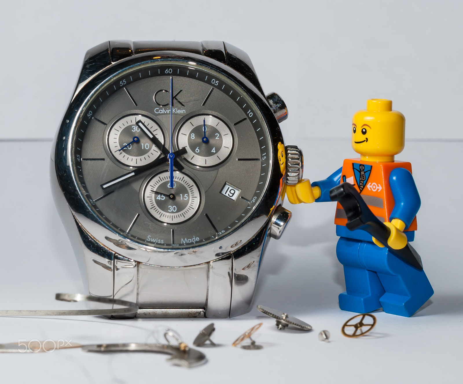 Nikon D3000 sample photo. Clock repair photography