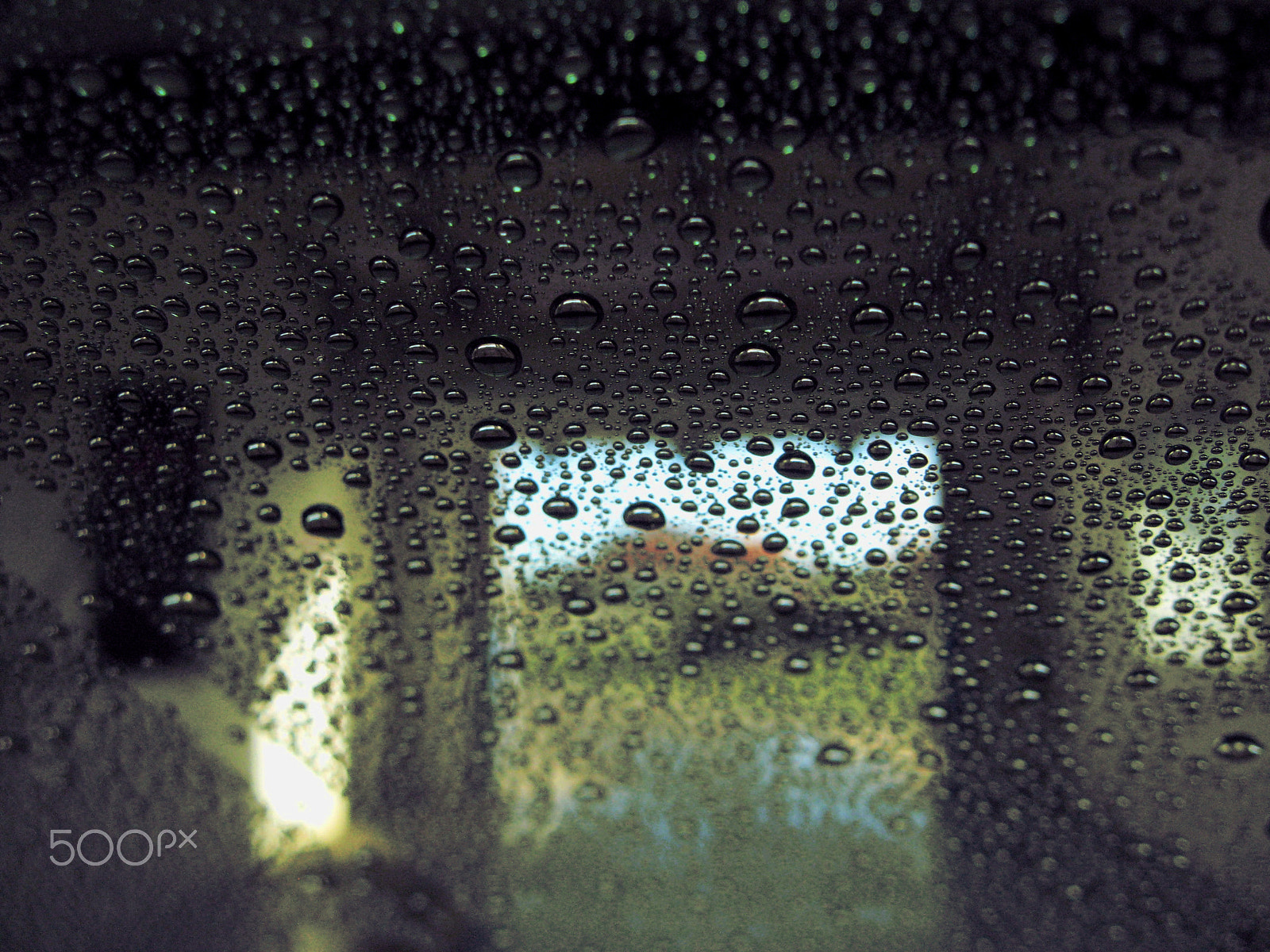 Canon POWERSHOT A560 sample photo. Wet car window photography