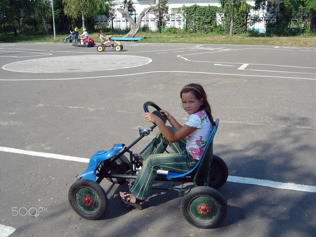 Sony DSC-P10 sample photo. Little girl drive a car photography