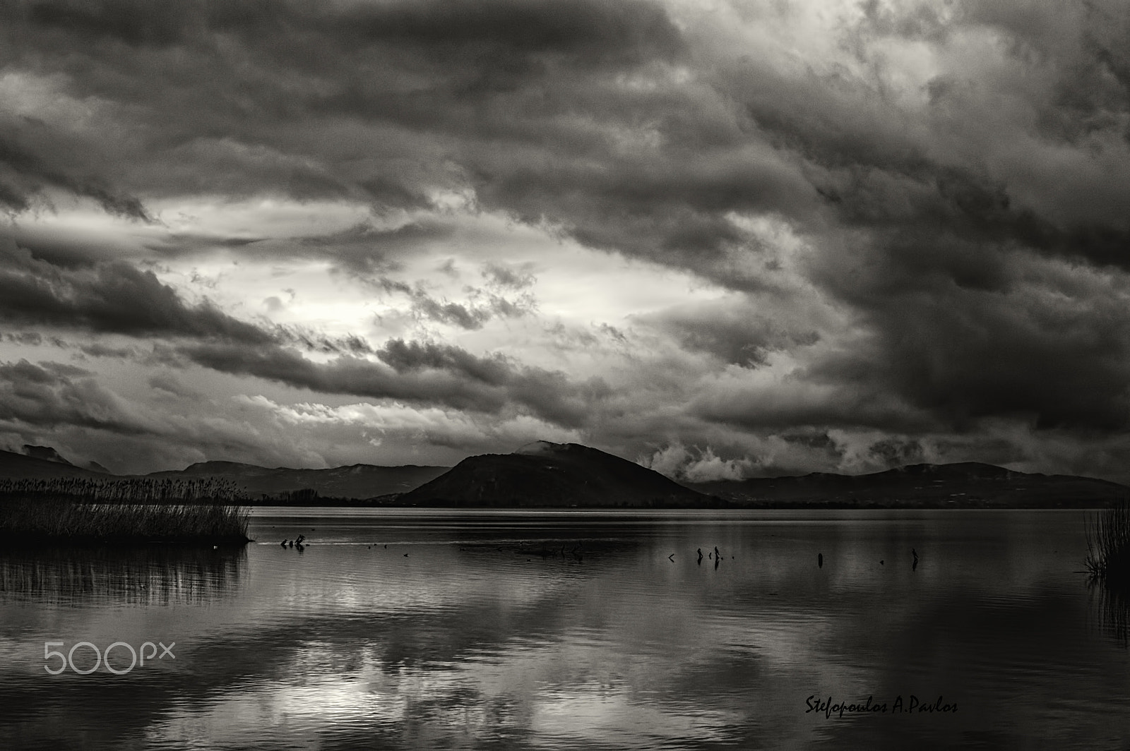 Sigma 28-105mm F2.8-4 Aspherical sample photo. The storm is coming over the lake photography