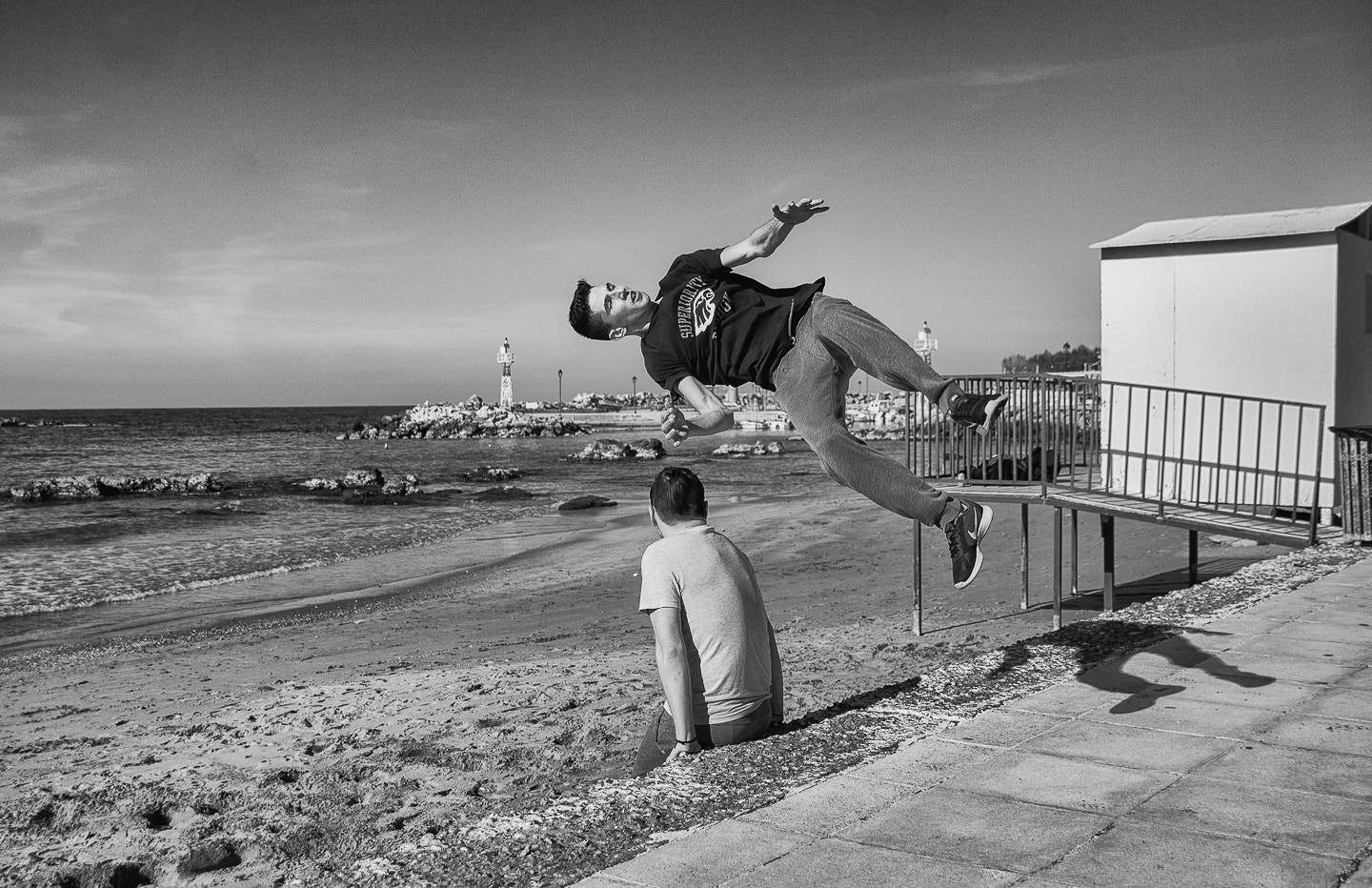 Sigma 18-250mm F3.5-6.3 DC OS HSM sample photo. Parkour practice at seashore photography