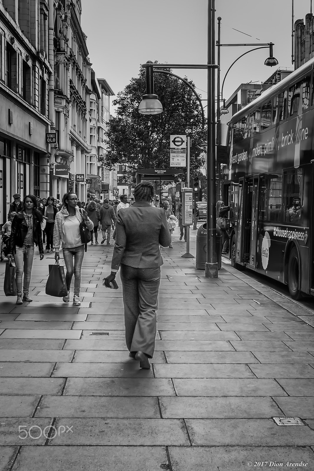 Canon EF-S 24mm F2.8 STM sample photo. Walk down oxford street photography