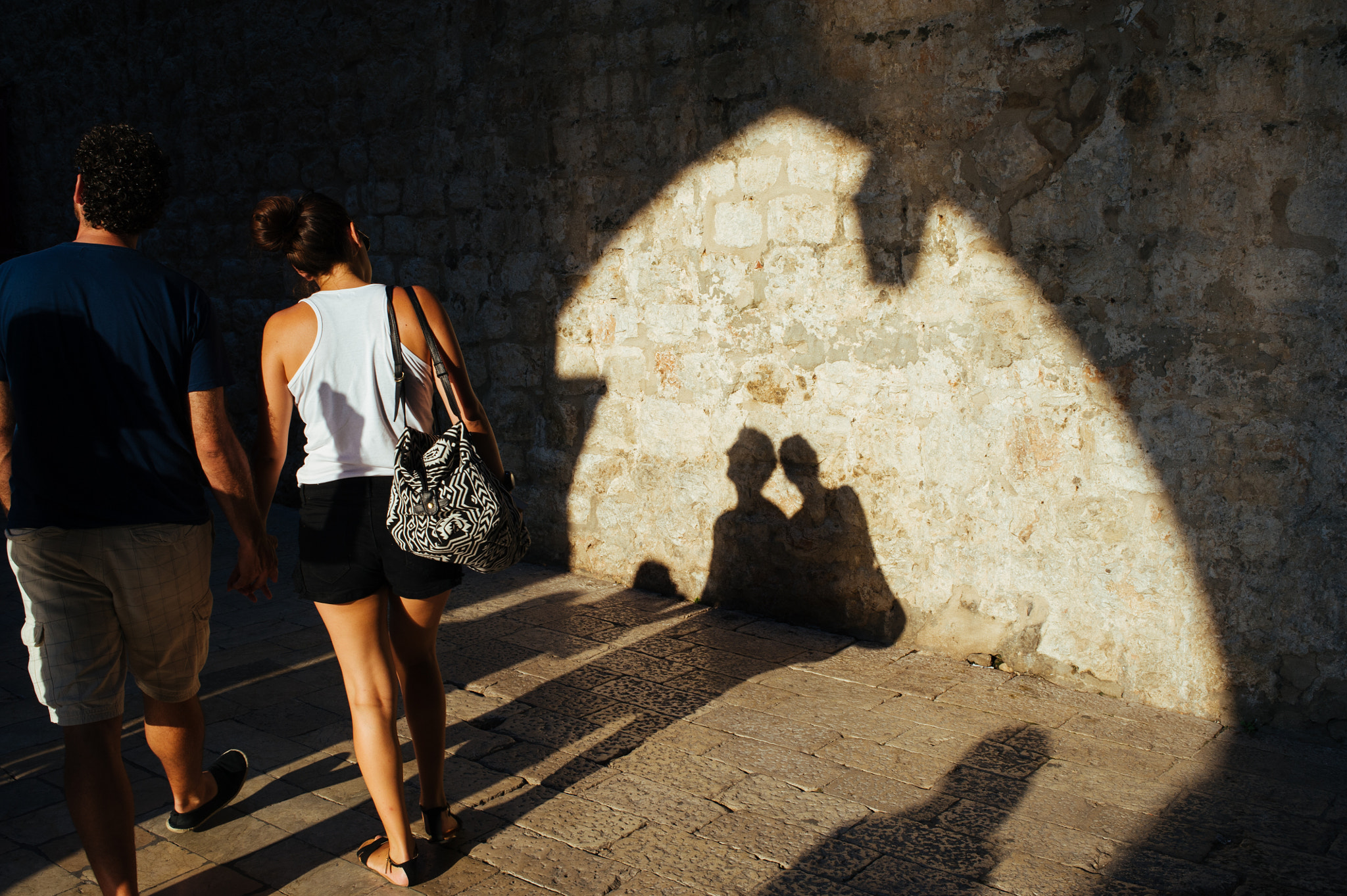 Nikon AF Nikkor 35mm F2D sample photo. Holding hands photography