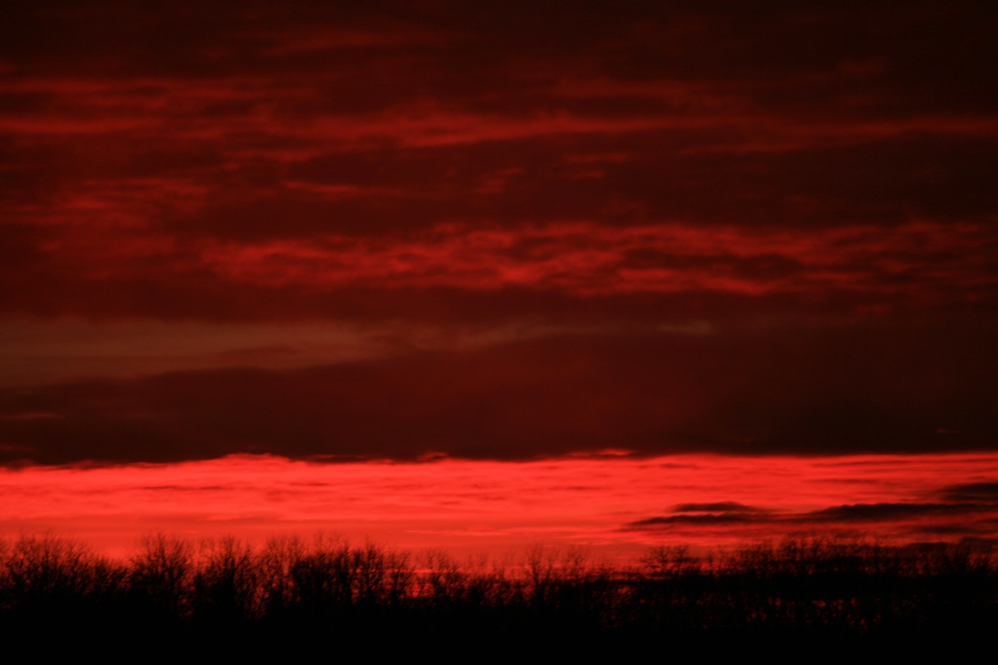Canon EF-S 55-250mm F4-5.6 IS sample photo. Darkened sunset photography