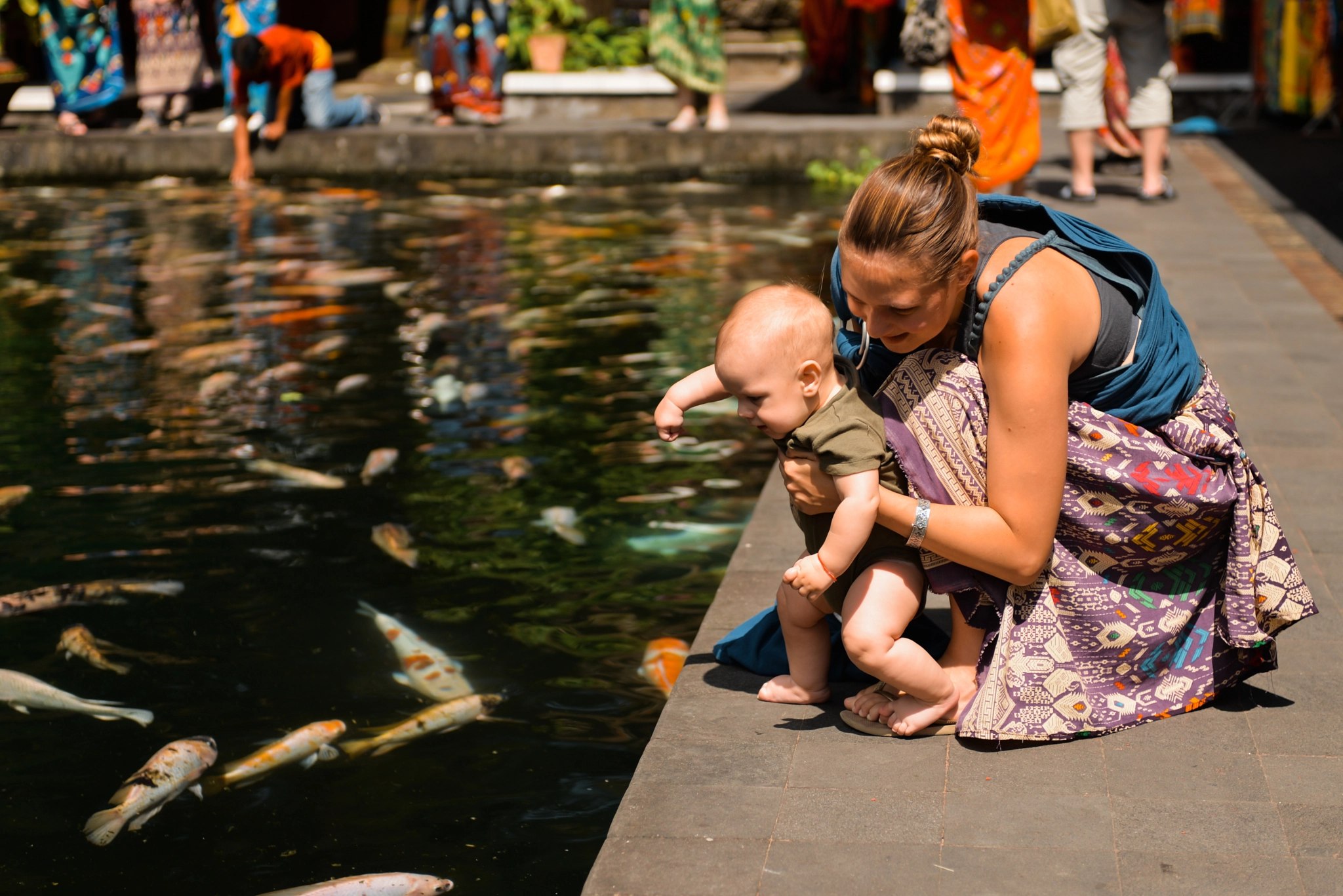 Nikon AF-S Nikkor 28-70mm F2.8 ED-IF sample photo. Mom with a baby on bali photography