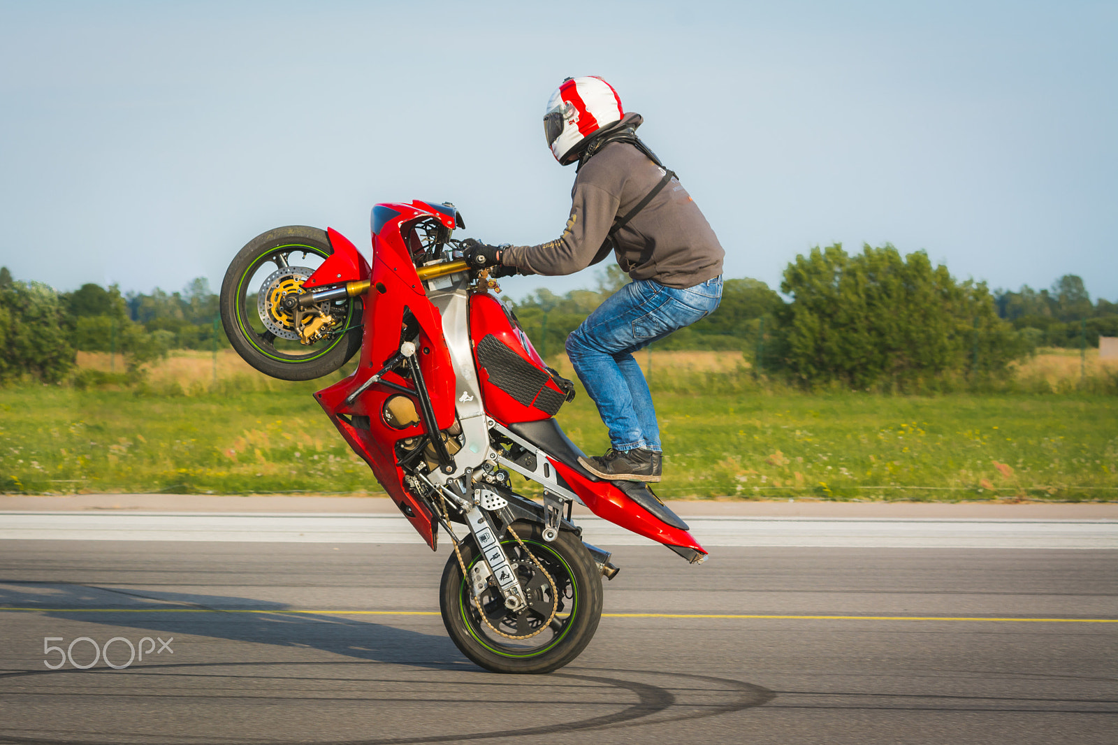 Sigma 70-200mm F2.8 EX DG OS HSM sample photo. Stunt bike on rear wheel photography