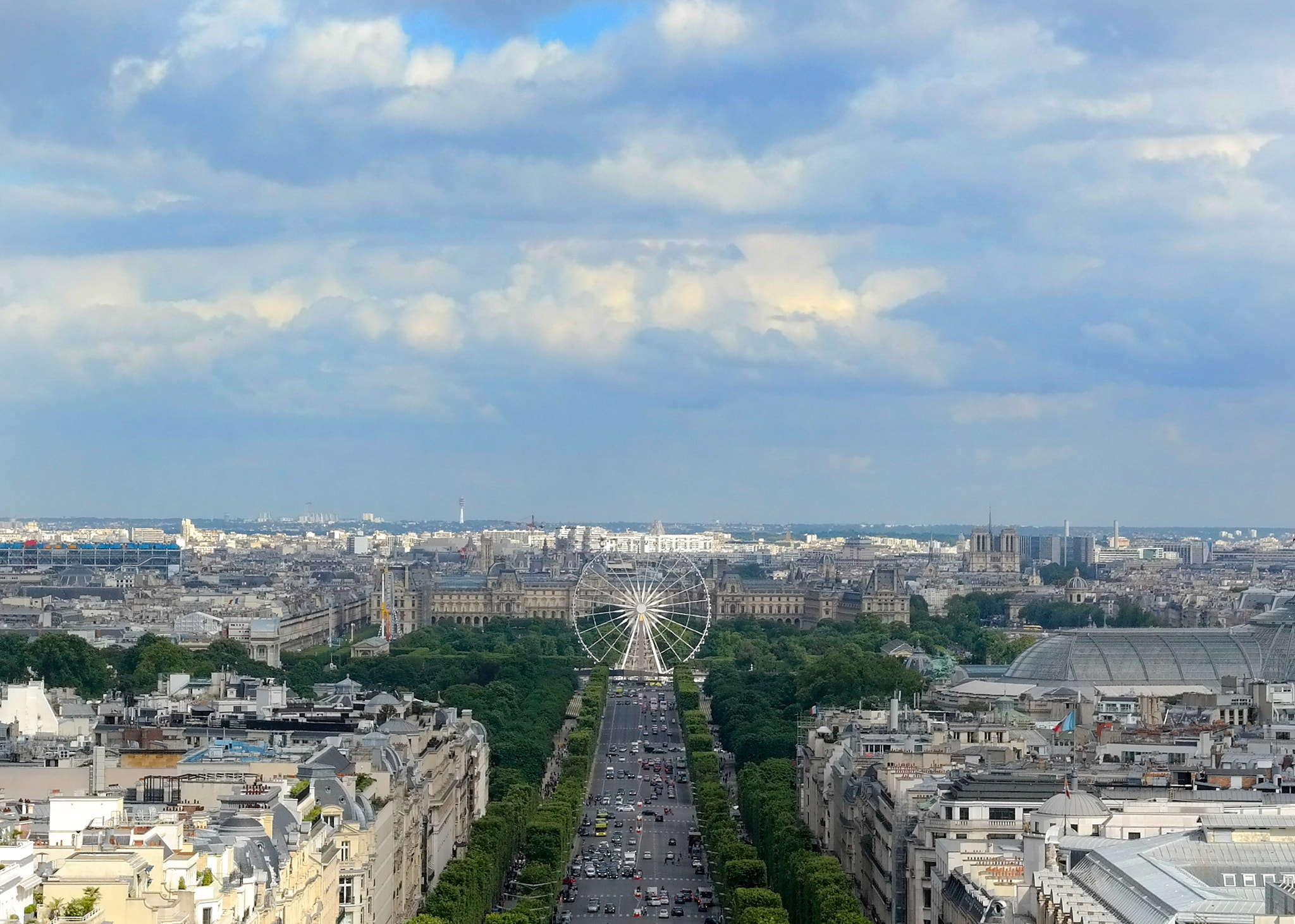 Samsung NX300M sample photo. Ferris wheel at champs-Élysées photography