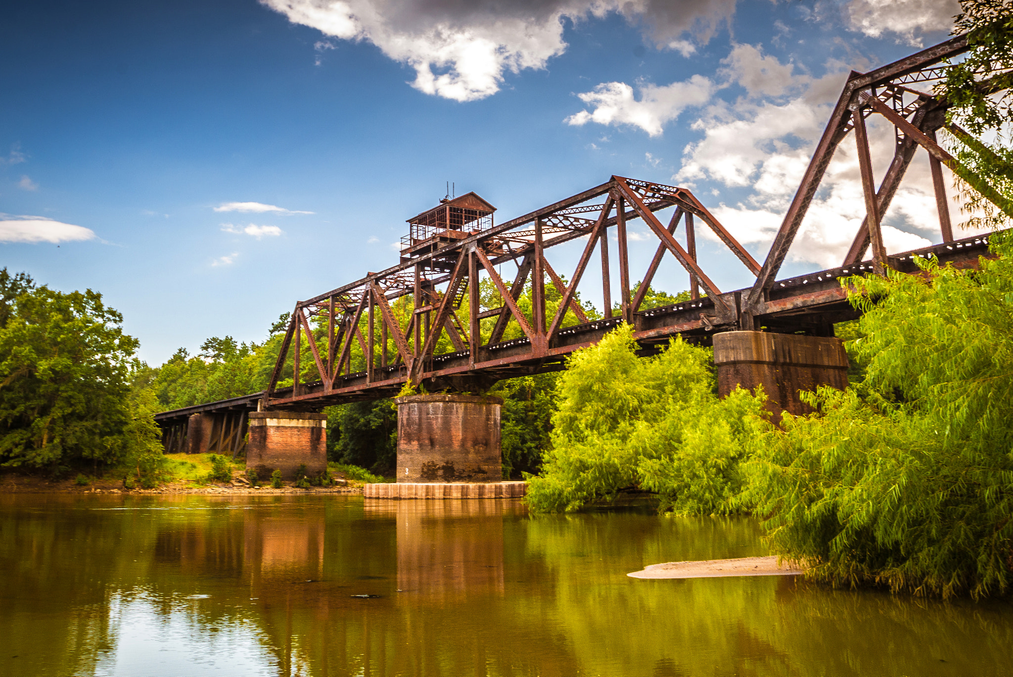 Nikon D600 sample photo. Reflections of train trestle bridge over river photography