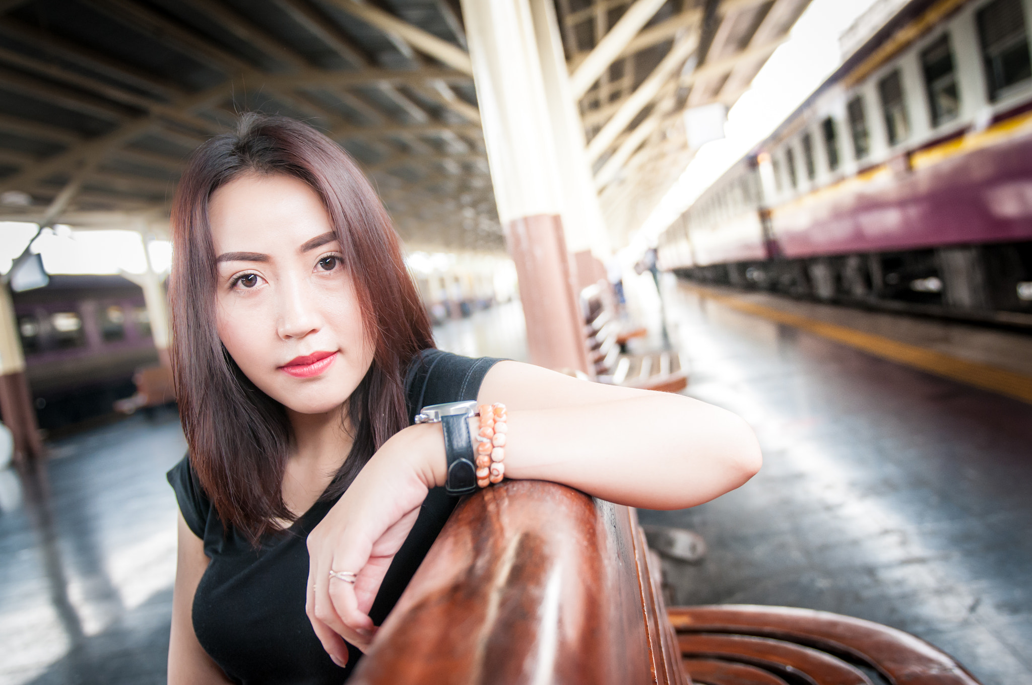 Nikon AF-S Nikkor 24-70mm F2.8G ED sample photo. Asian woman in train station. photography