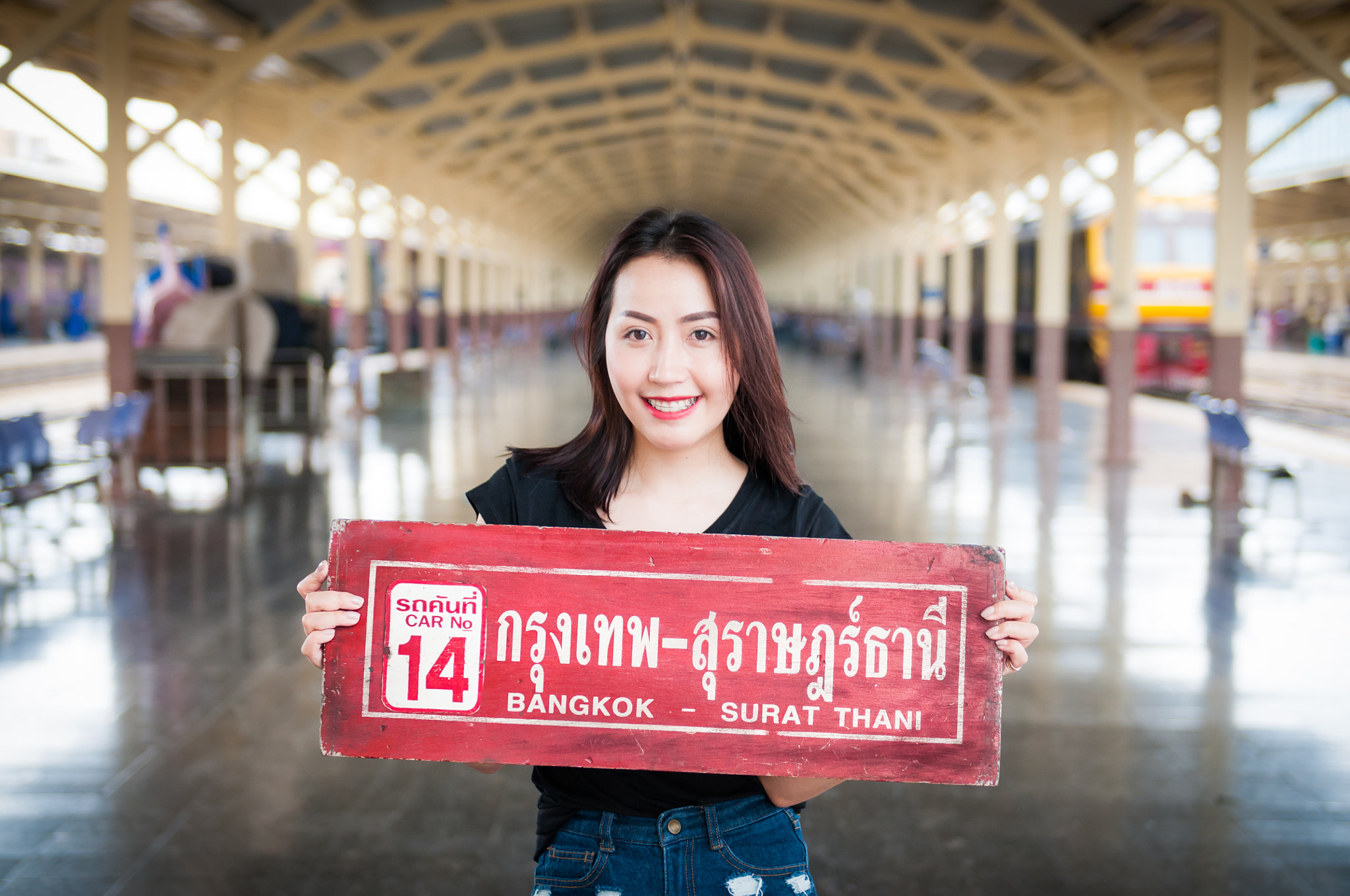 Nikon AF-S Nikkor 24-70mm F2.8G ED sample photo. Asian woman in train station. photography