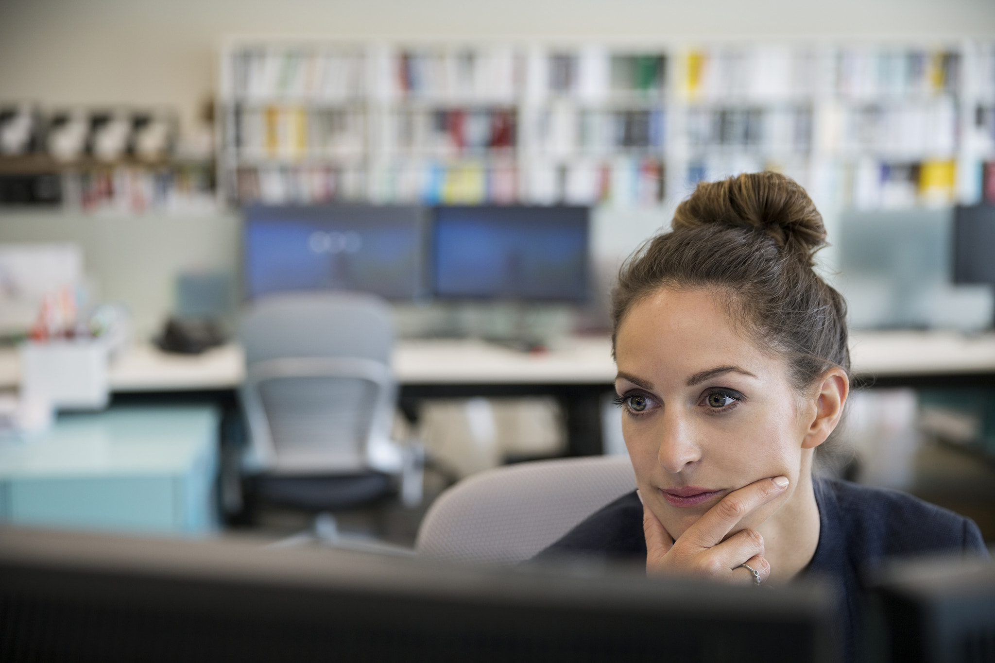 Focused businesswoman working at computer in office