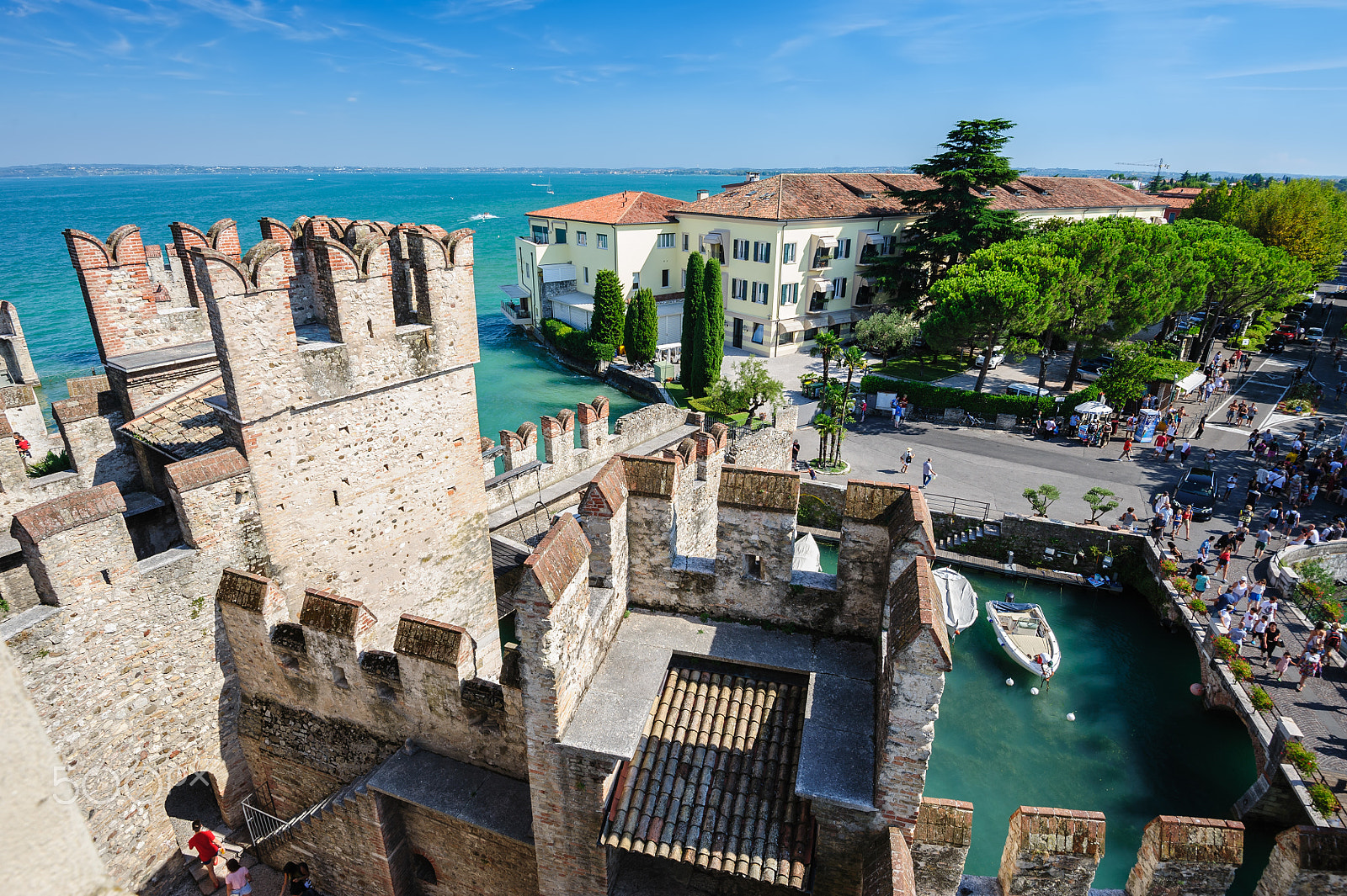 Nikon AF-S Nikkor 16-35mm F4G ED VR sample photo. Medieval castle scaliger in old town sirmione on lake lago di garda, northern italy photography