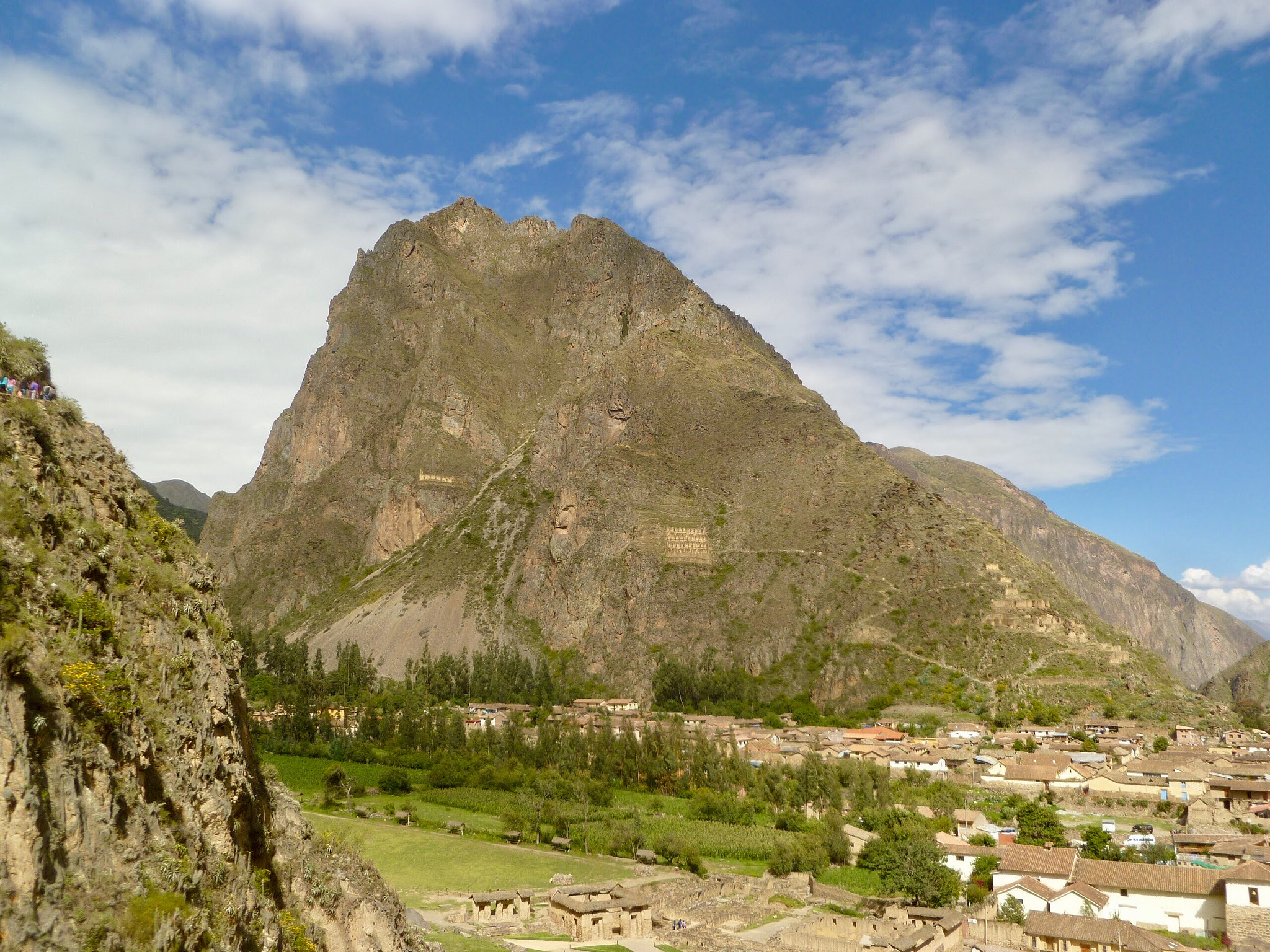 Panasonic DMC-FH20 sample photo. The face of wiracocha and the storehouses above the town of ollantaytambo - peru. photography