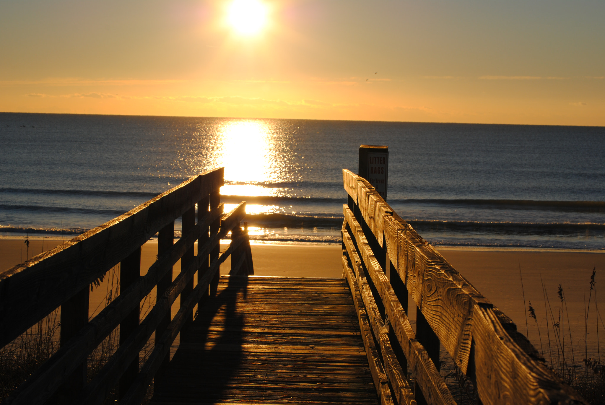 Nikon D3000 sample photo. Beach walkway in the evening photography