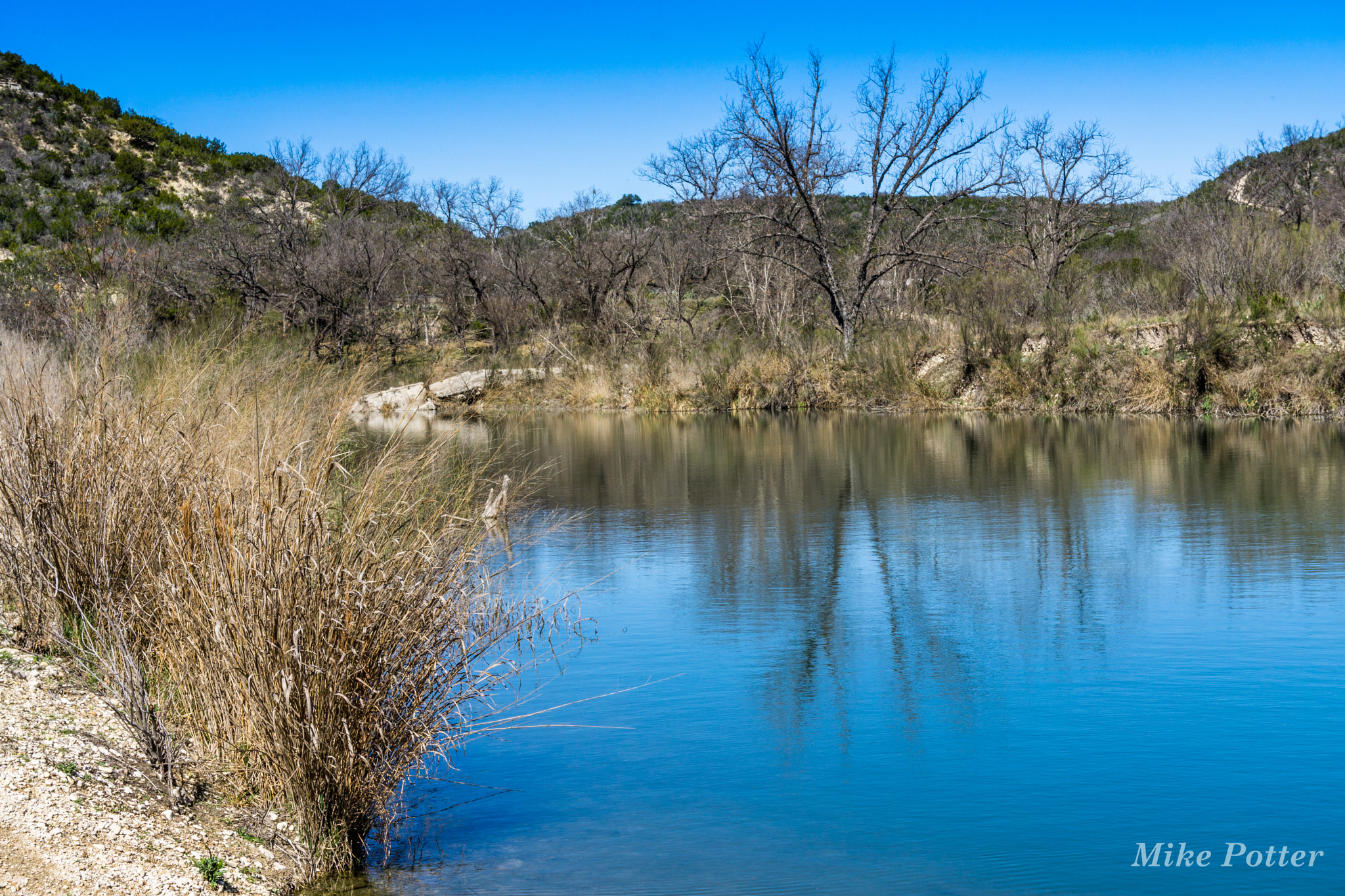 Sony a6000 + Sony E 18-55mm F3.5-5.6 OSS sample photo. Along the river photography