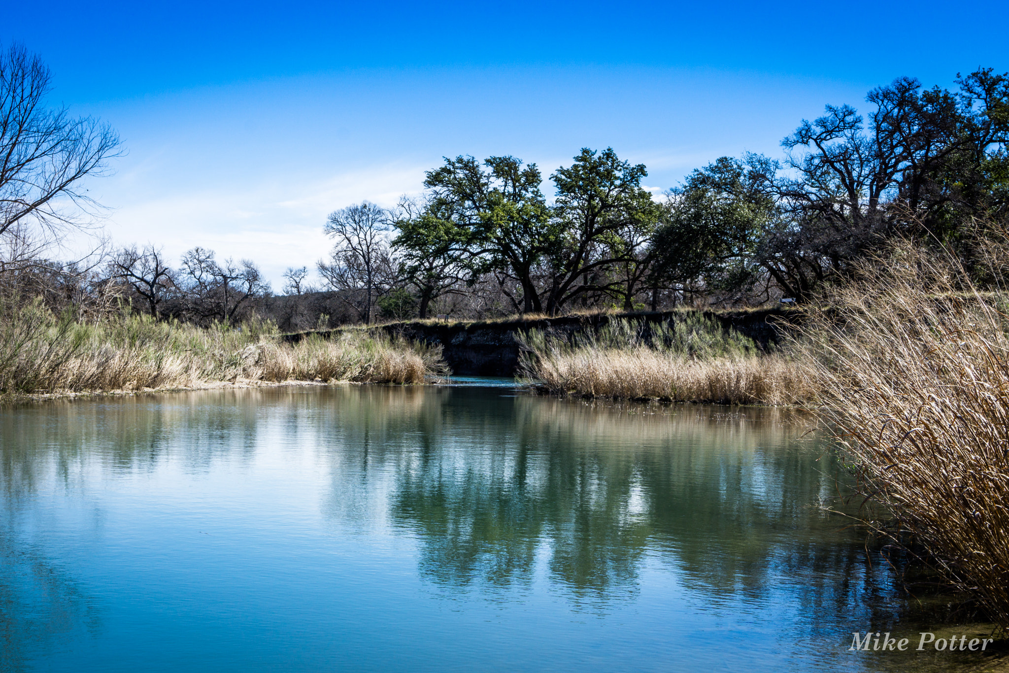 Sony a6000 + Sony E 18-55mm F3.5-5.6 OSS sample photo. Along the river photography