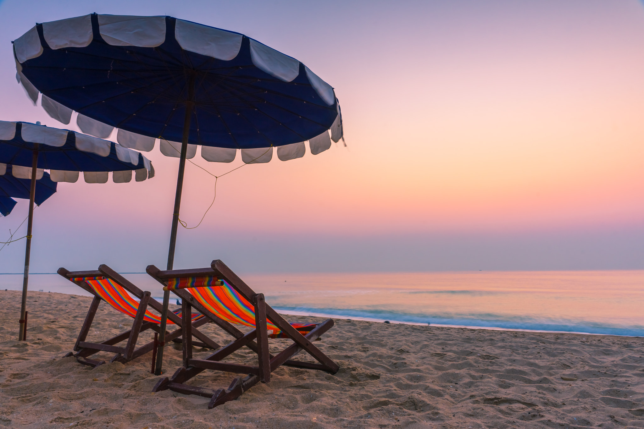 Sony a7 sample photo. Chaises longues on the beach at sunrise photography