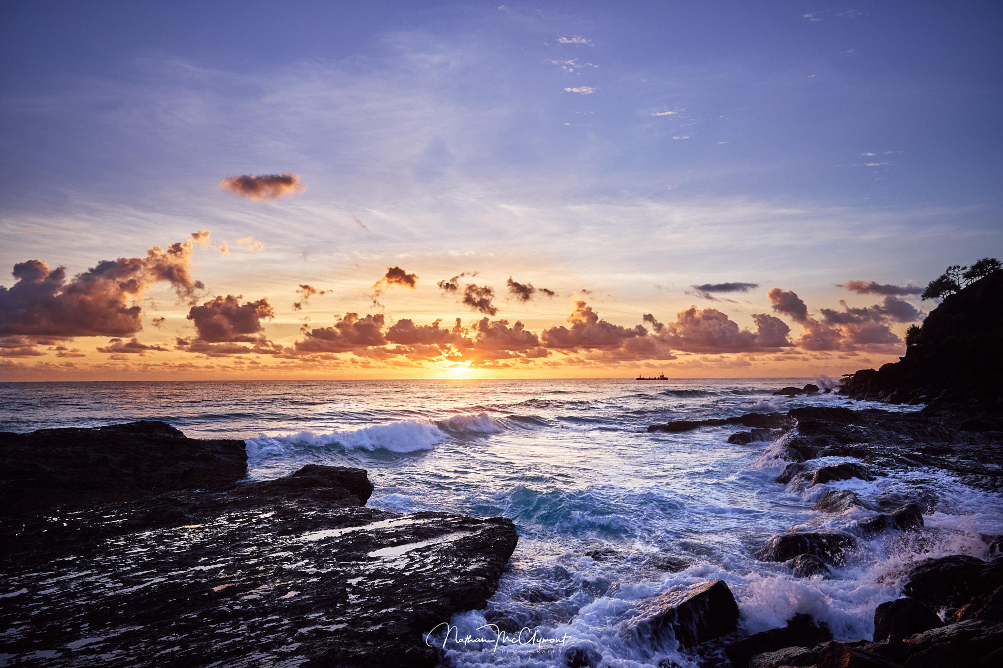 Sony E 10-18mm F4 OSS sample photo. Sunrise plus rocks photography