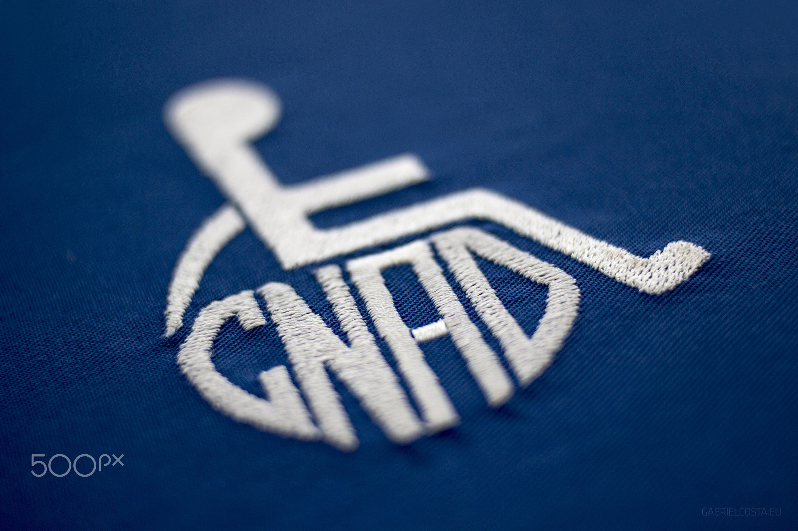 Canon EOS 70D + Canon EF 35mm F2 sample photo. Cnad - logotipo bordado photography