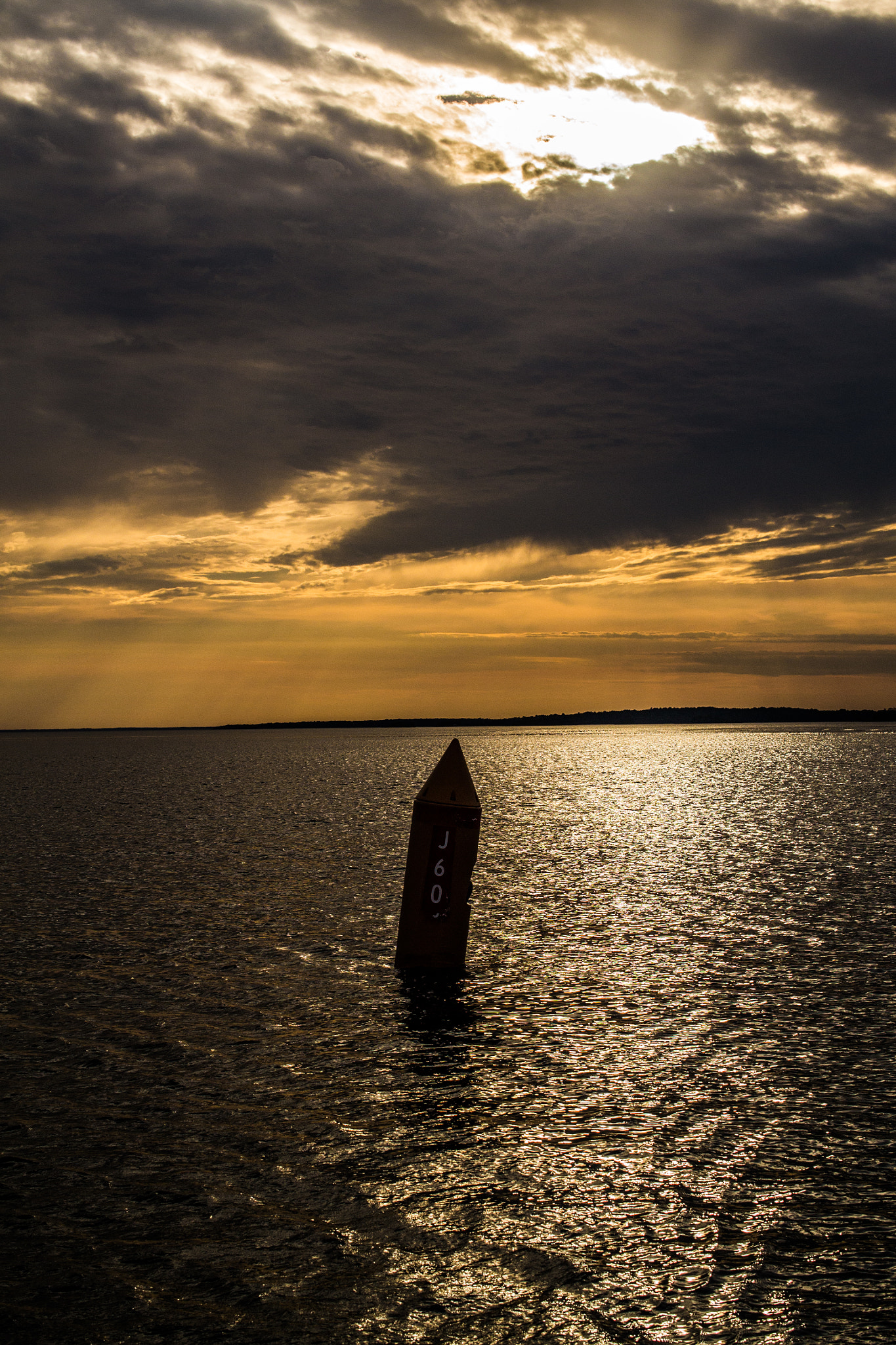 Nikon AF-S DX Micro Nikkor 40mm F2.8 sample photo. Sailing away from the storm photography