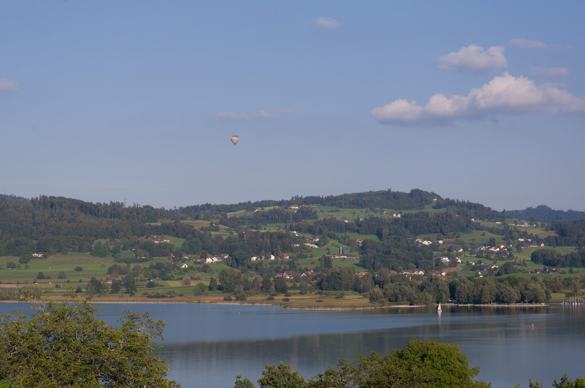 Pentax K-x sample photo. Hot air balloon over a lake photography