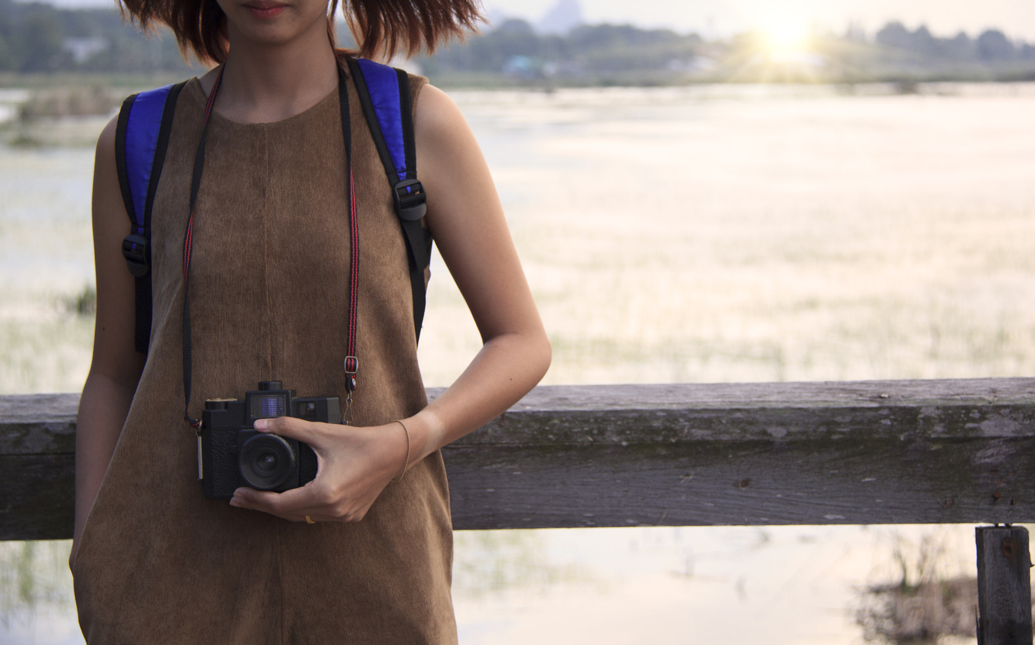 Canon EF-S 18-200mm F3.5-5.6 IS sample photo. Hipster traveler with backpack and taking photo of amazing lands photography