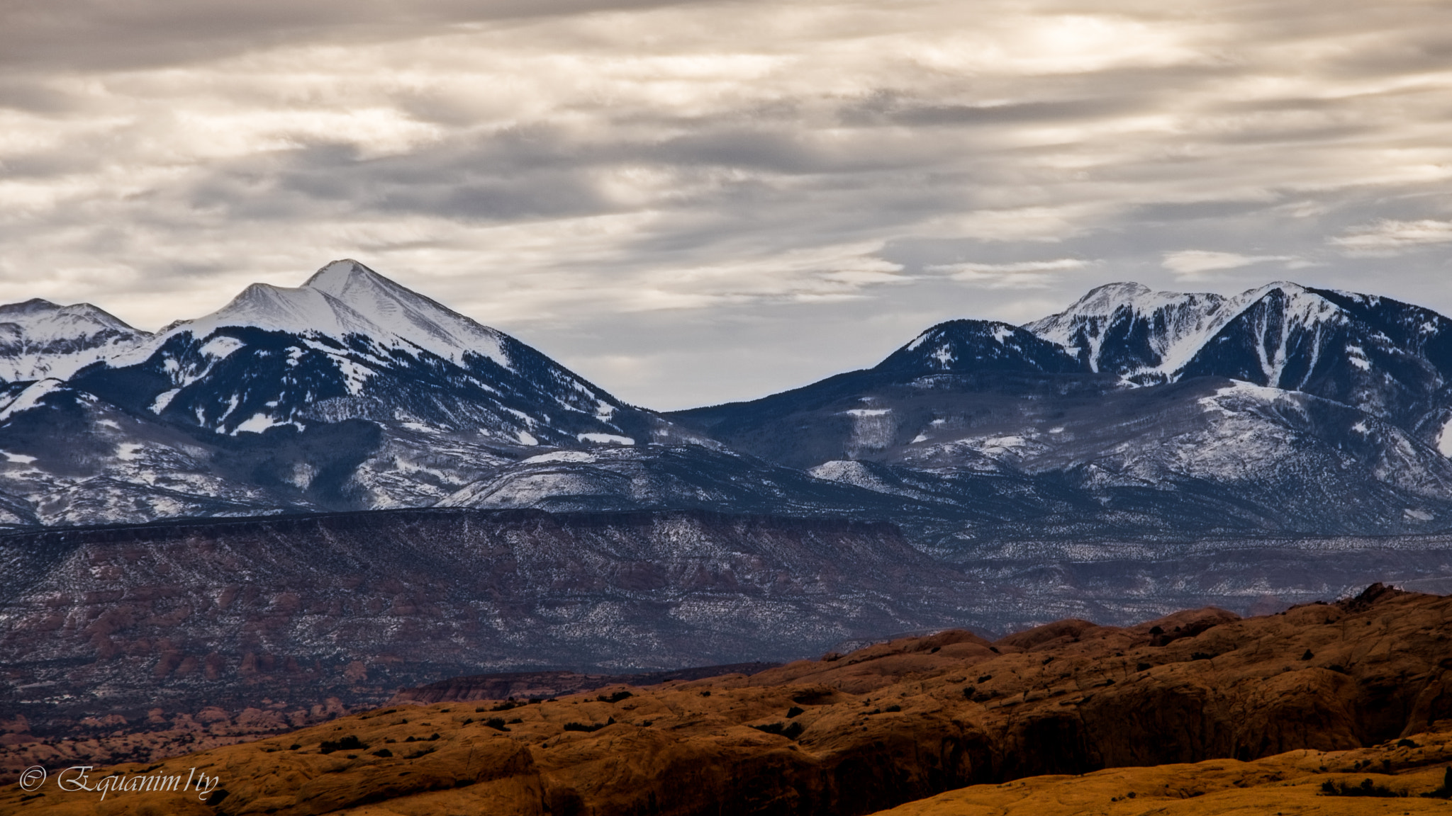 Canon EOS 750D (EOS Rebel T6i / EOS Kiss X8i) sample photo. Lal sal mountains behind arches photography