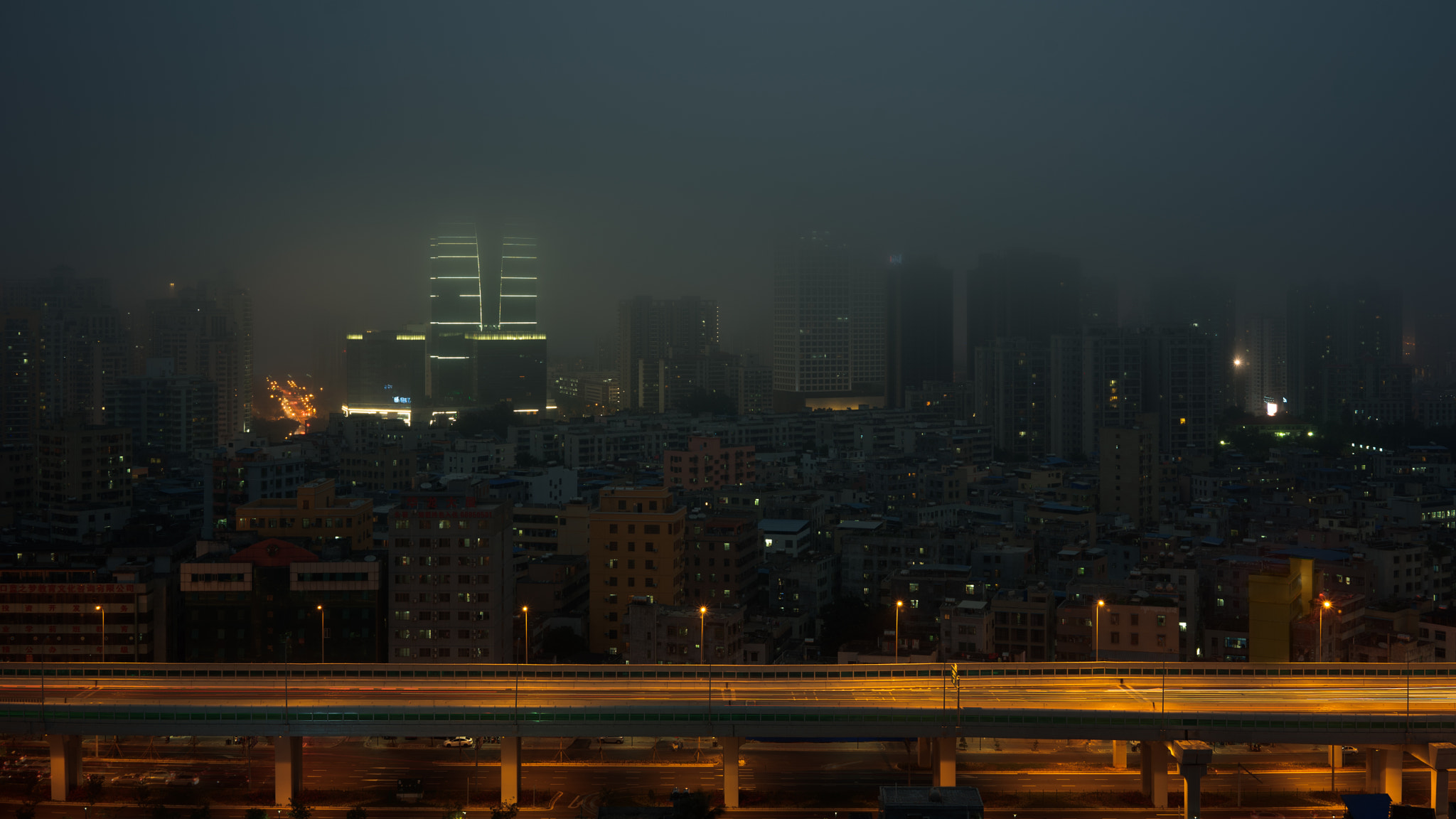 Sony a7 sample photo. City in the fog photography