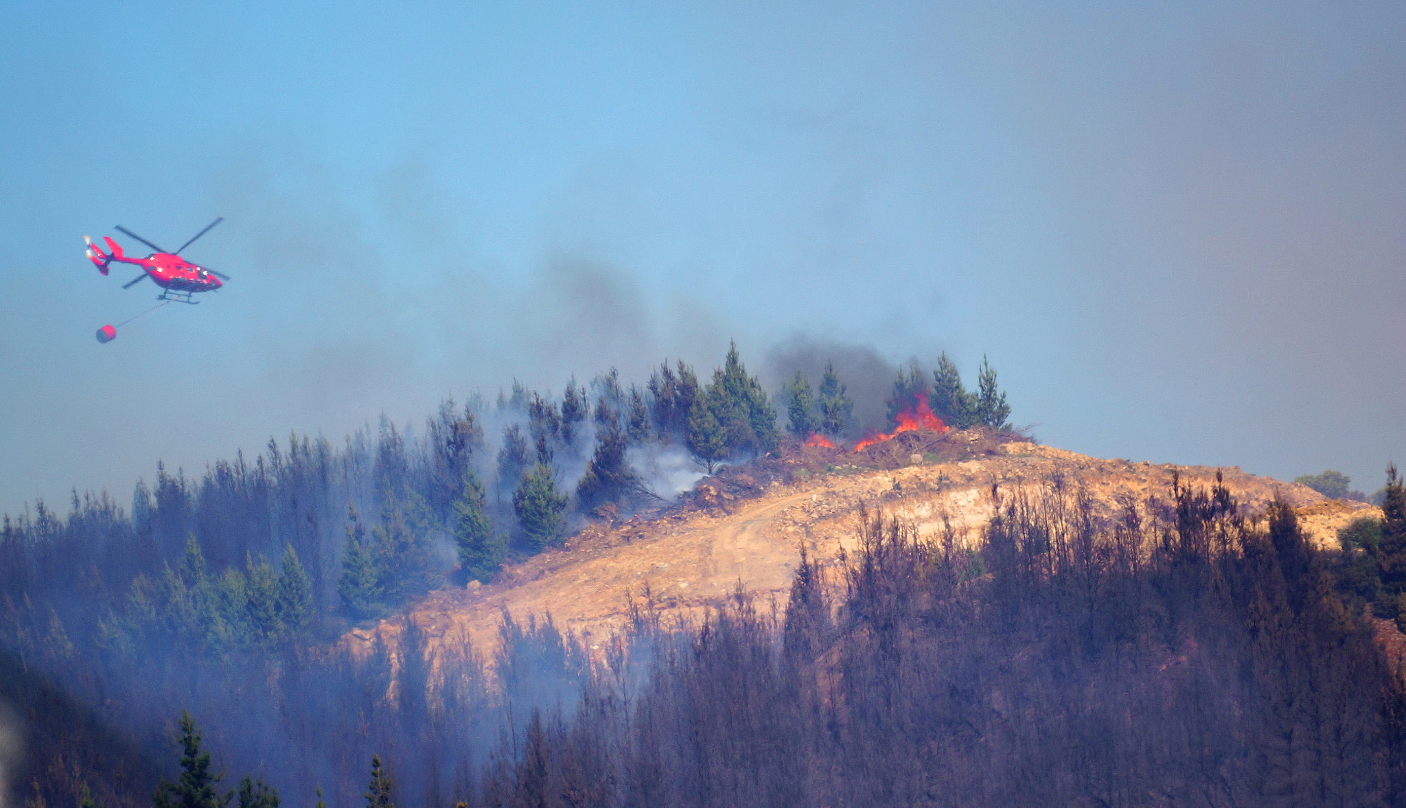 Sony 500mm F8 Reflex sample photo. Helicopters working hard to put out a bushfire photography