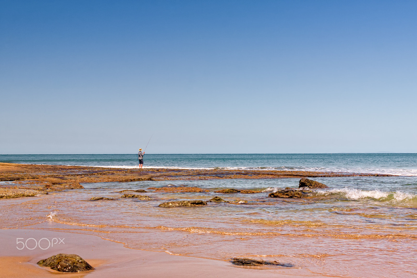 Canon EF-S 24mm F2.8 STM sample photo. Fishing by the sea photography