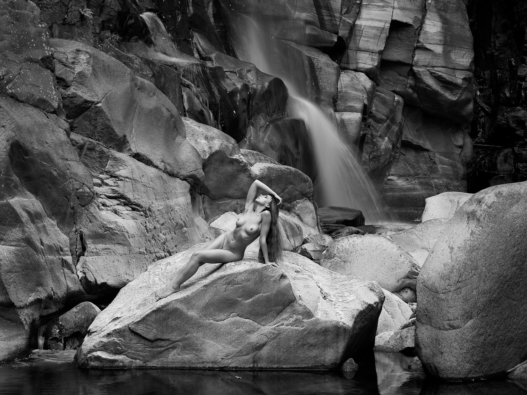 Nikon D810 sample photo. Flowing hair and water b&w photography