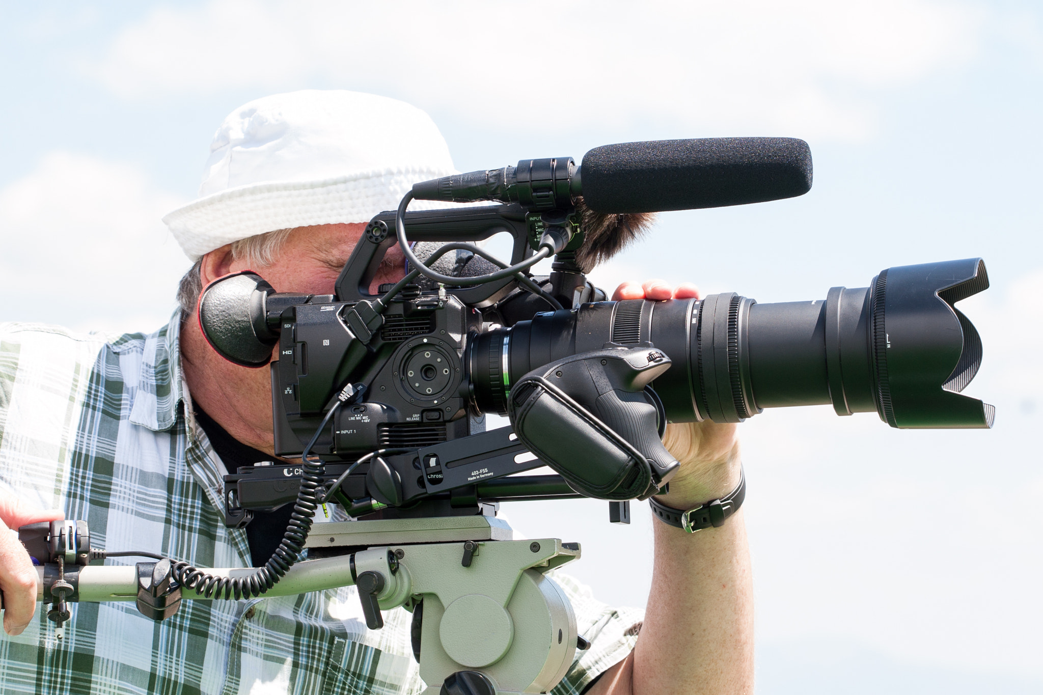 Canon EOS 30D + Canon EF 100mm F2.8 Macro USM sample photo. Krusevo, macedonia - june 21: german video operator films starting of competitors  at the 19th... photography