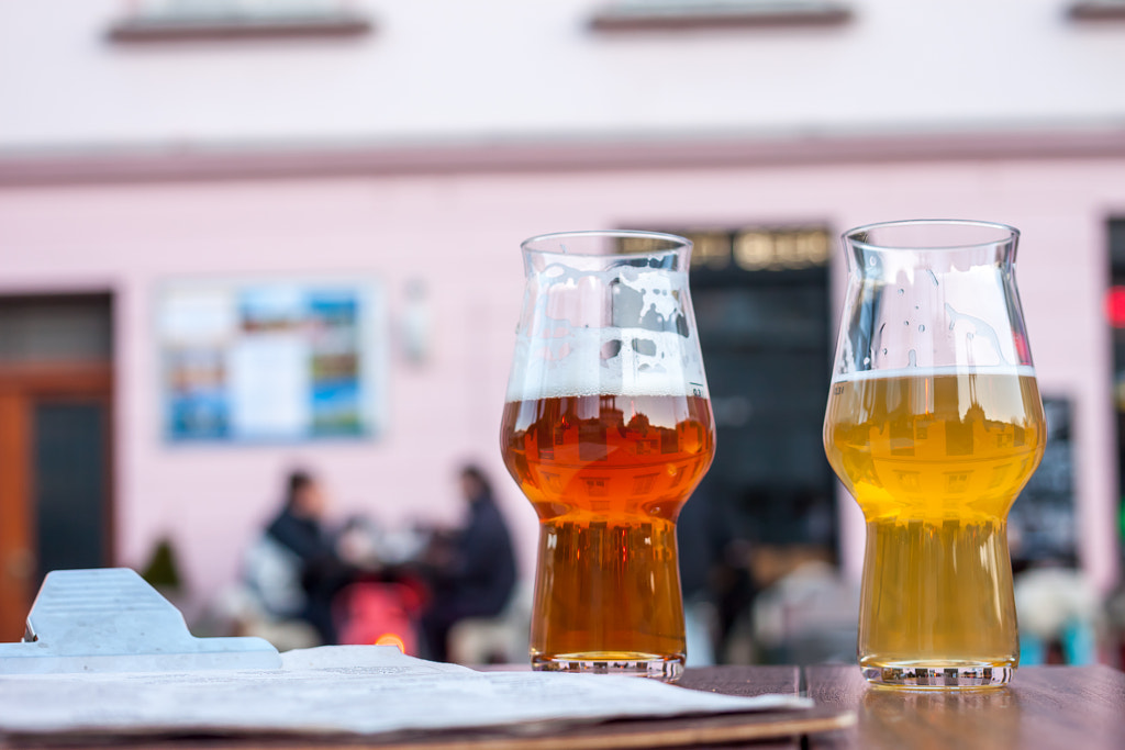 two glasses of beer on table edge by Anton Chechotkin on 500px.com