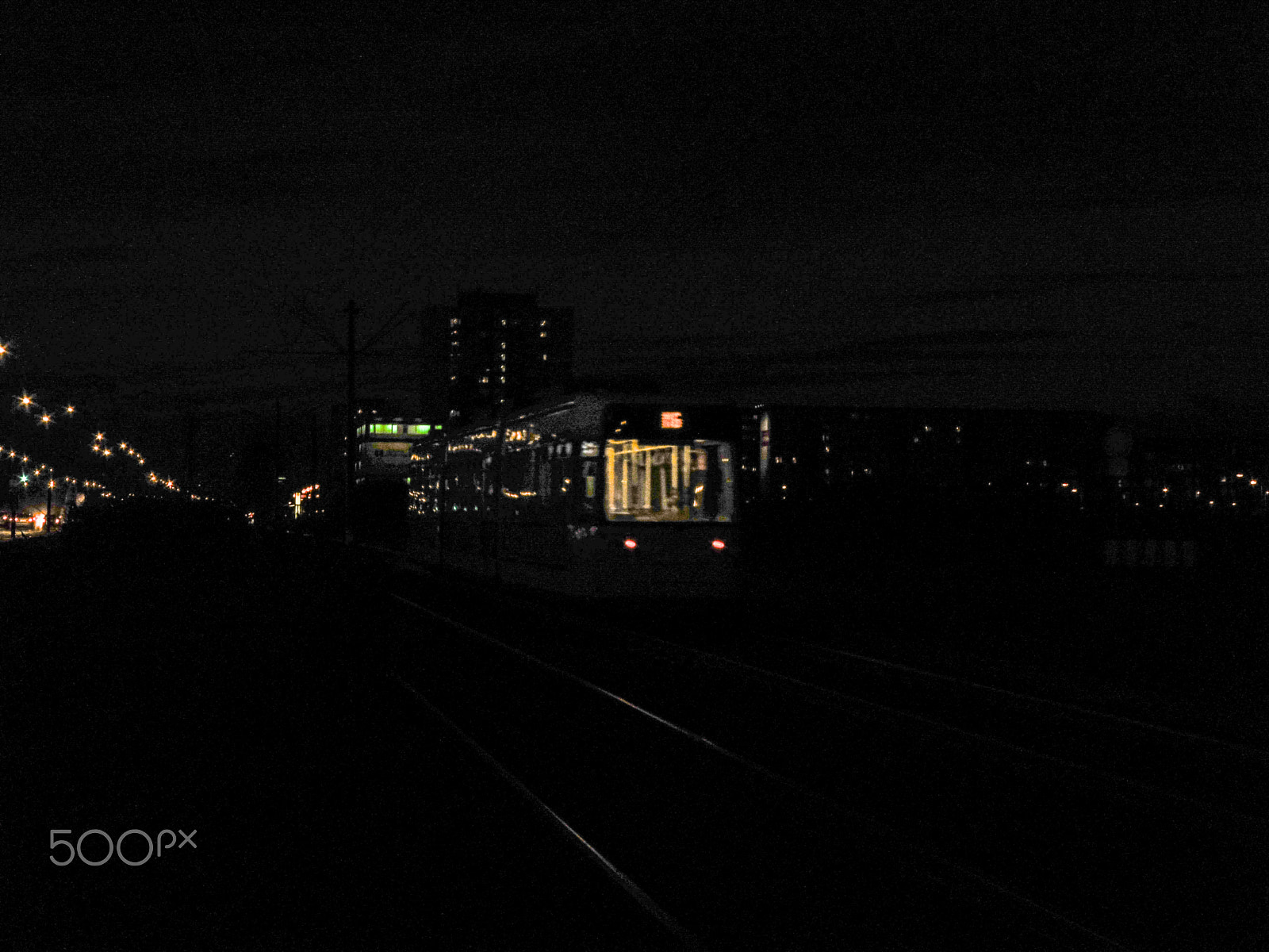 Panasonic DMC-TZ56 sample photo. Tram in darkness photography
