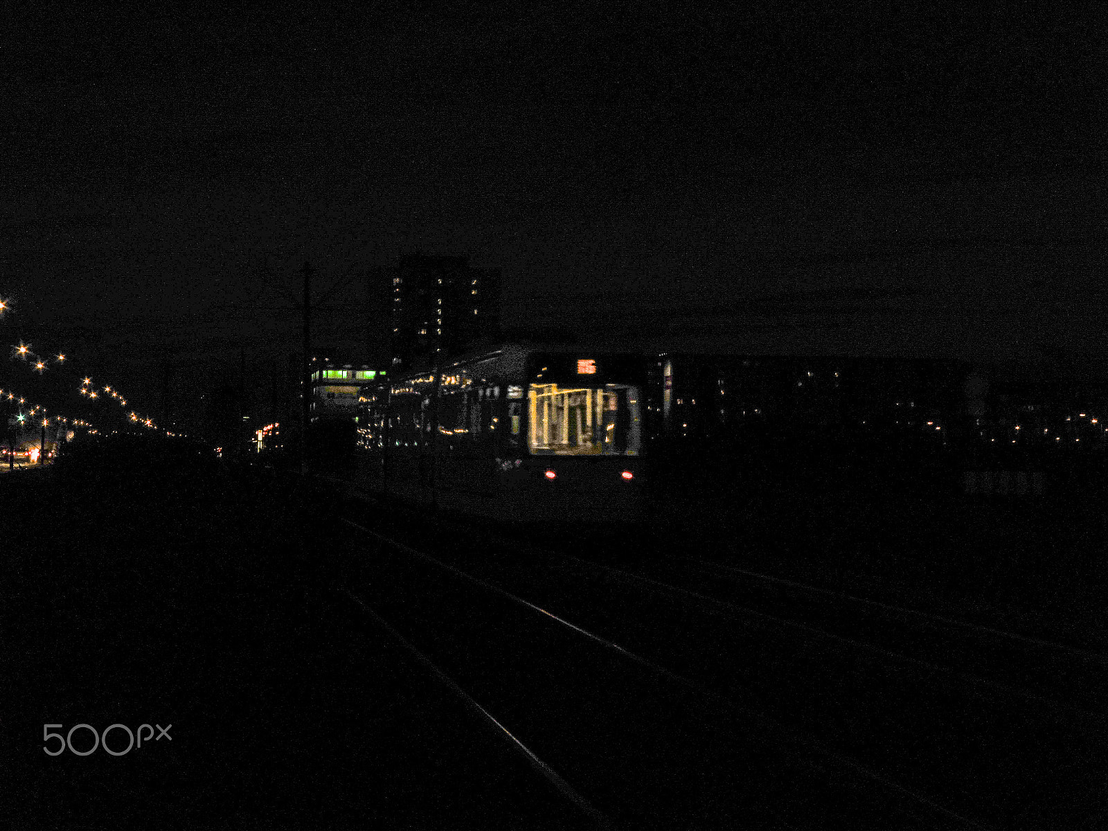 Panasonic DMC-TZ56 sample photo. Tram in darkness photography