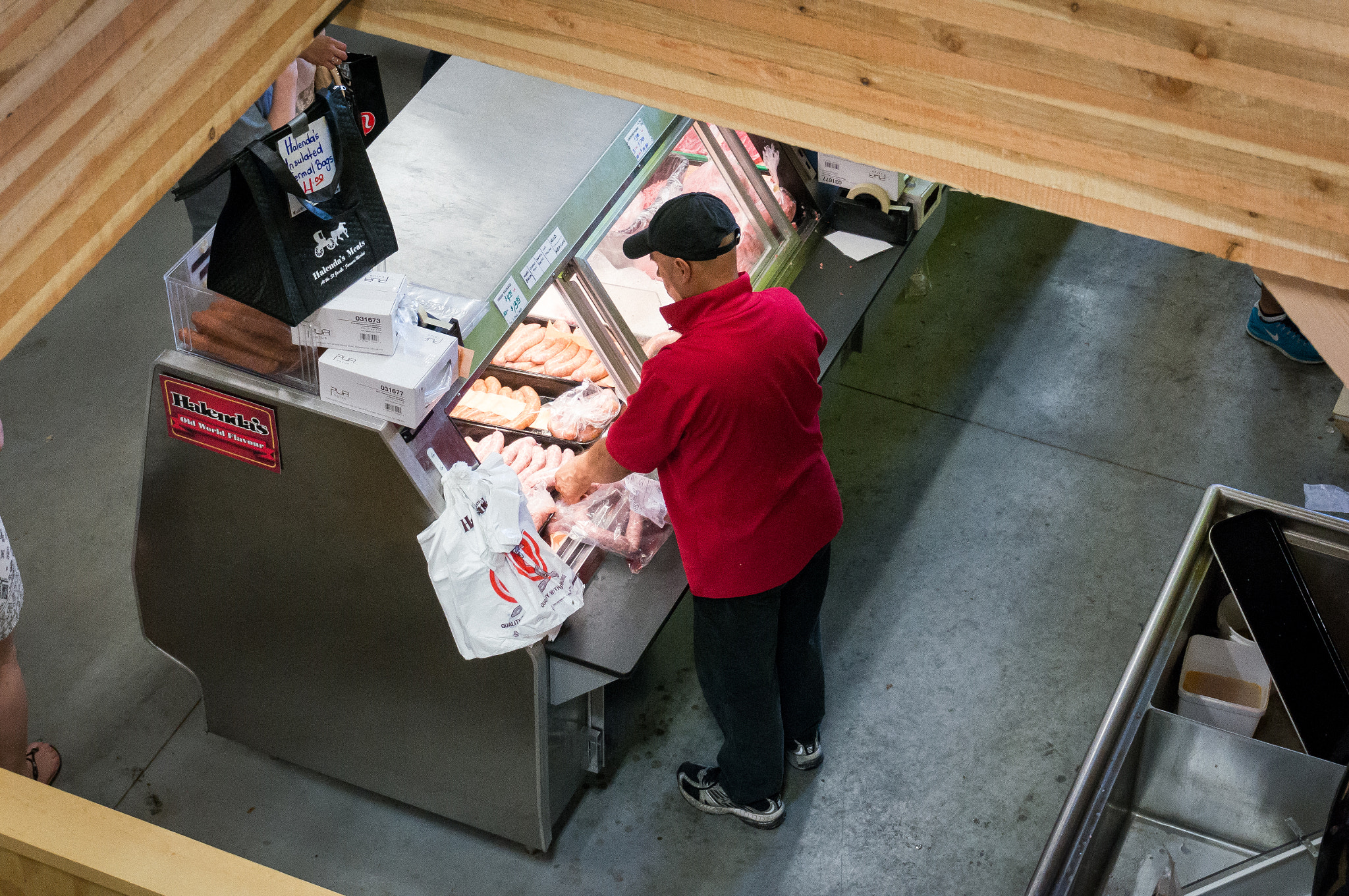 Sony Alpha NEX-6 sample photo. Above the deli counter photography