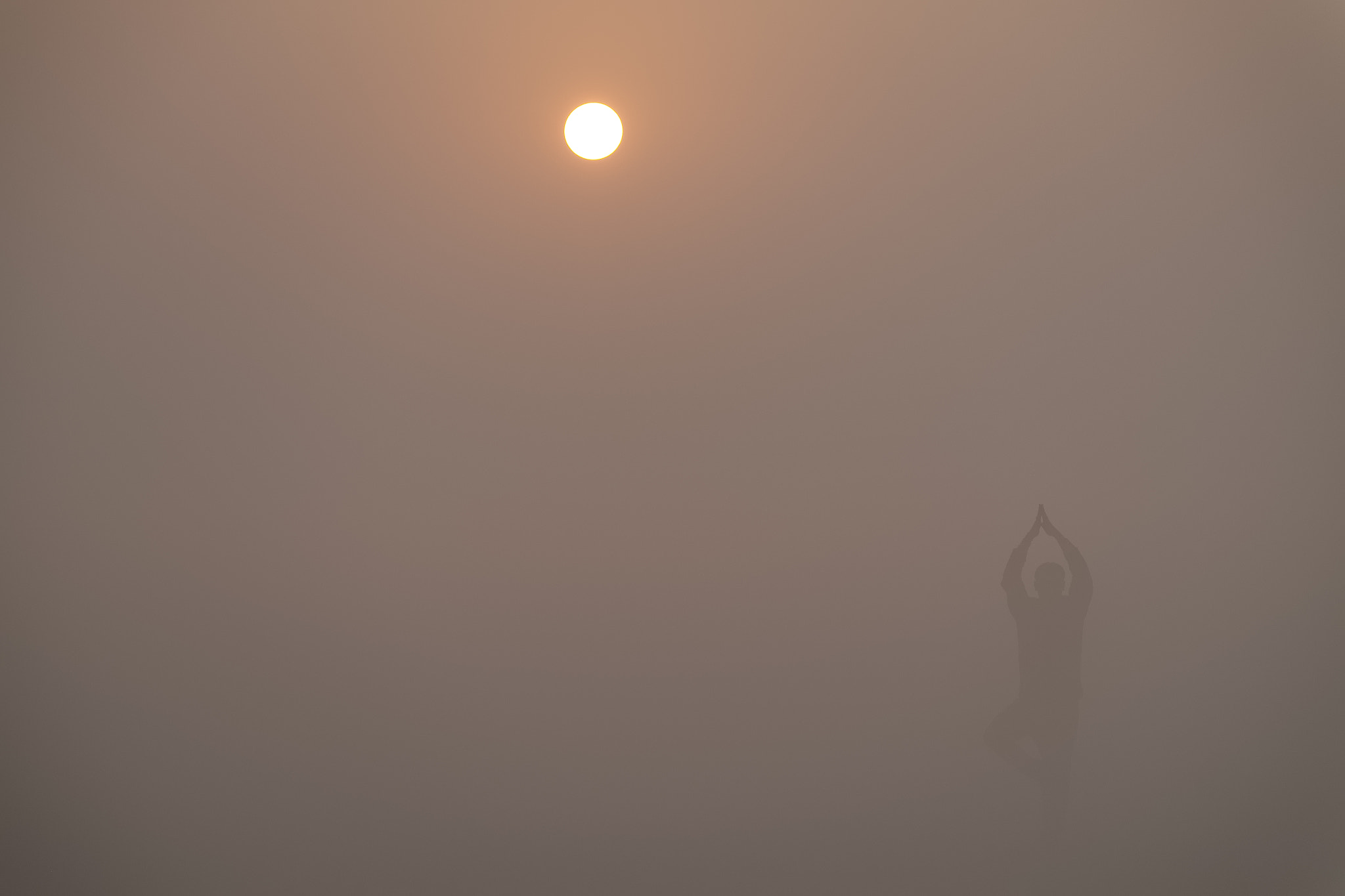 Fujifilm X-Pro1 + Fujifilm XF 55-200mm F3.5-4.8 R LM OIS sample photo. Surya namaskar at dawn - varanasi, india photography