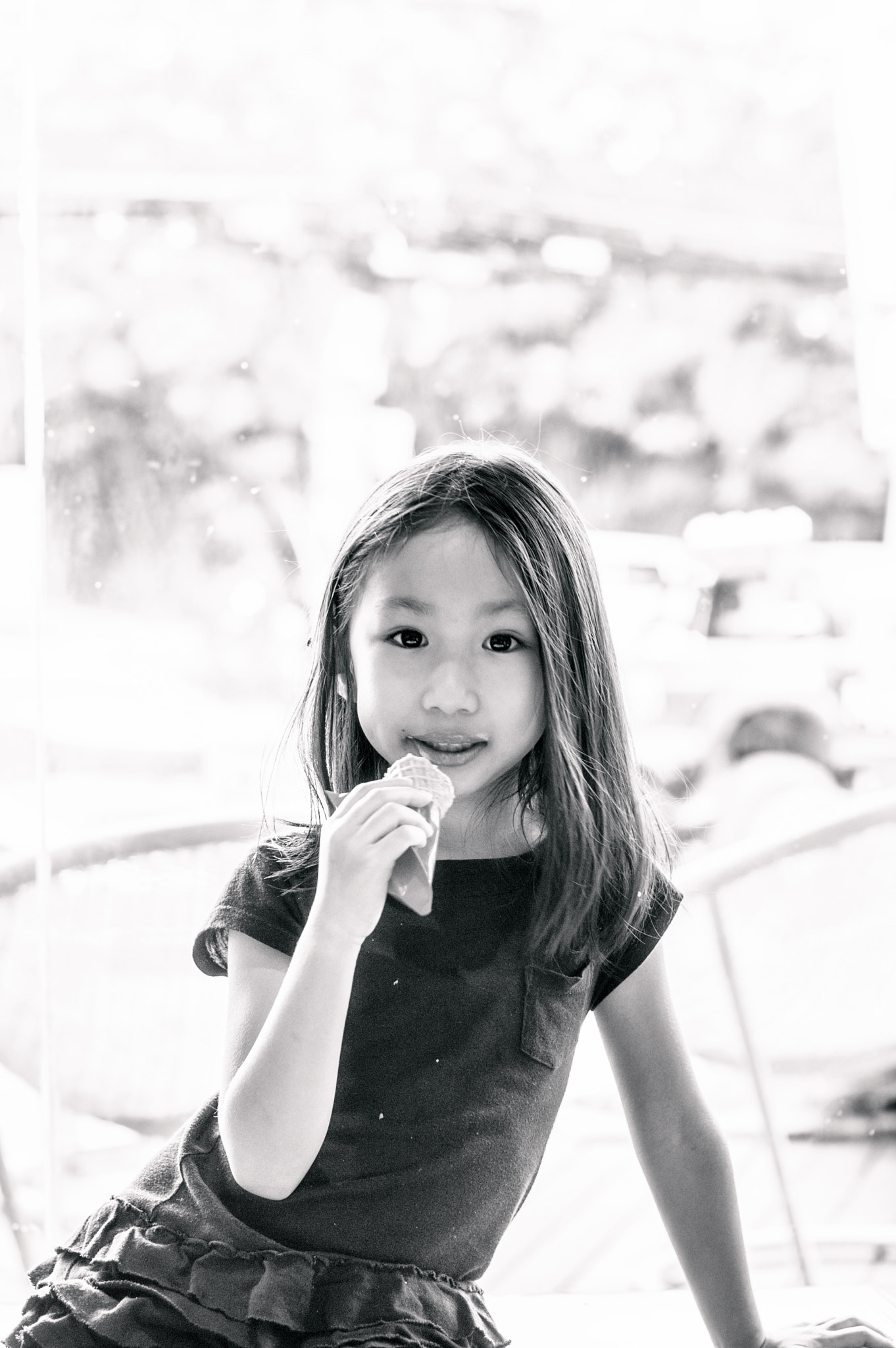 Nikon D70s + Nikon AF Nikkor 50mm F1.4D sample photo. Thai girl enjoys ice cream photography