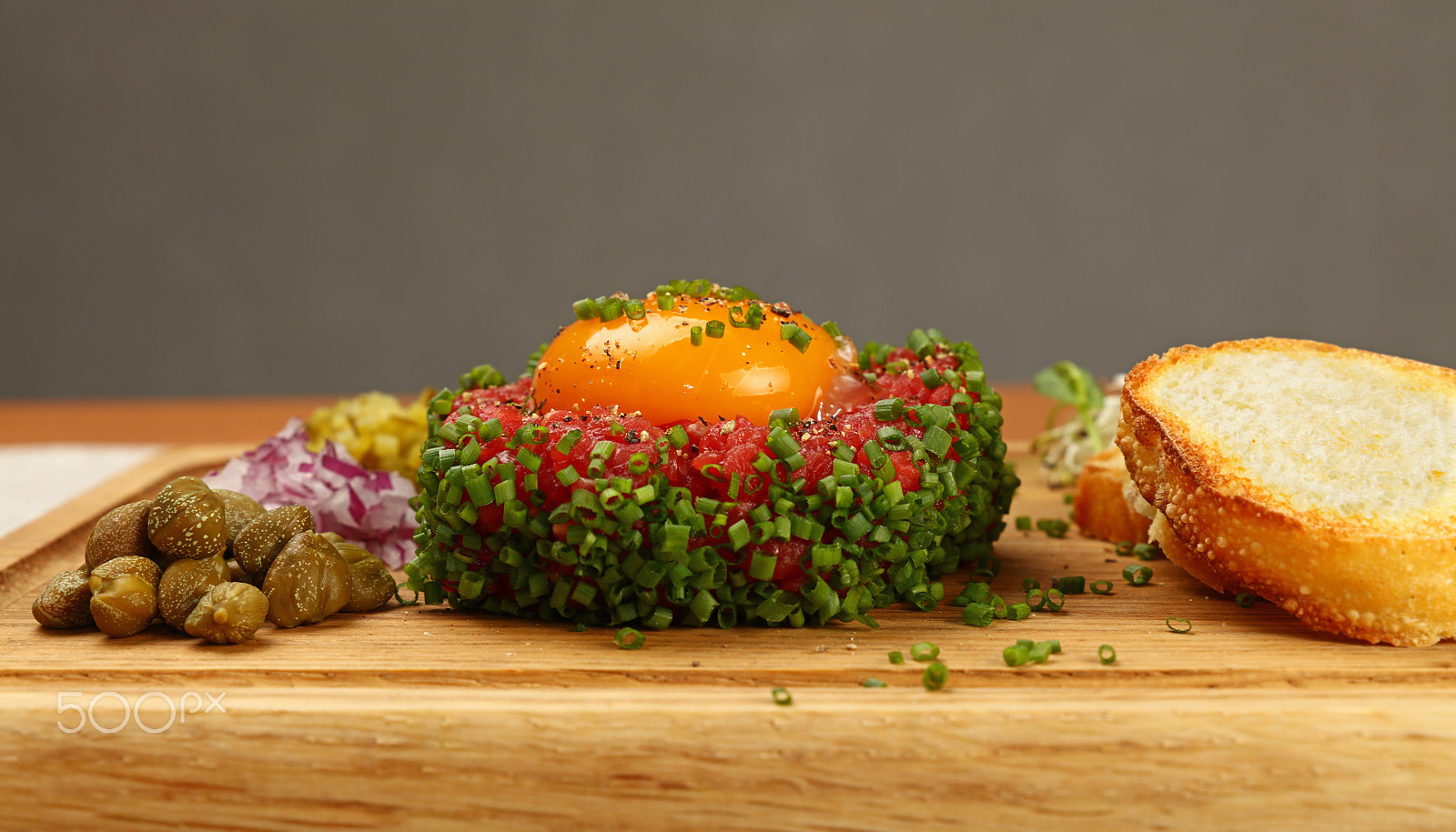 Canon EOS 5DS + Canon EF 24-105mm F3.5-5.6 IS STM sample photo. Tartare steak of raw minced beef with egg yolk photography