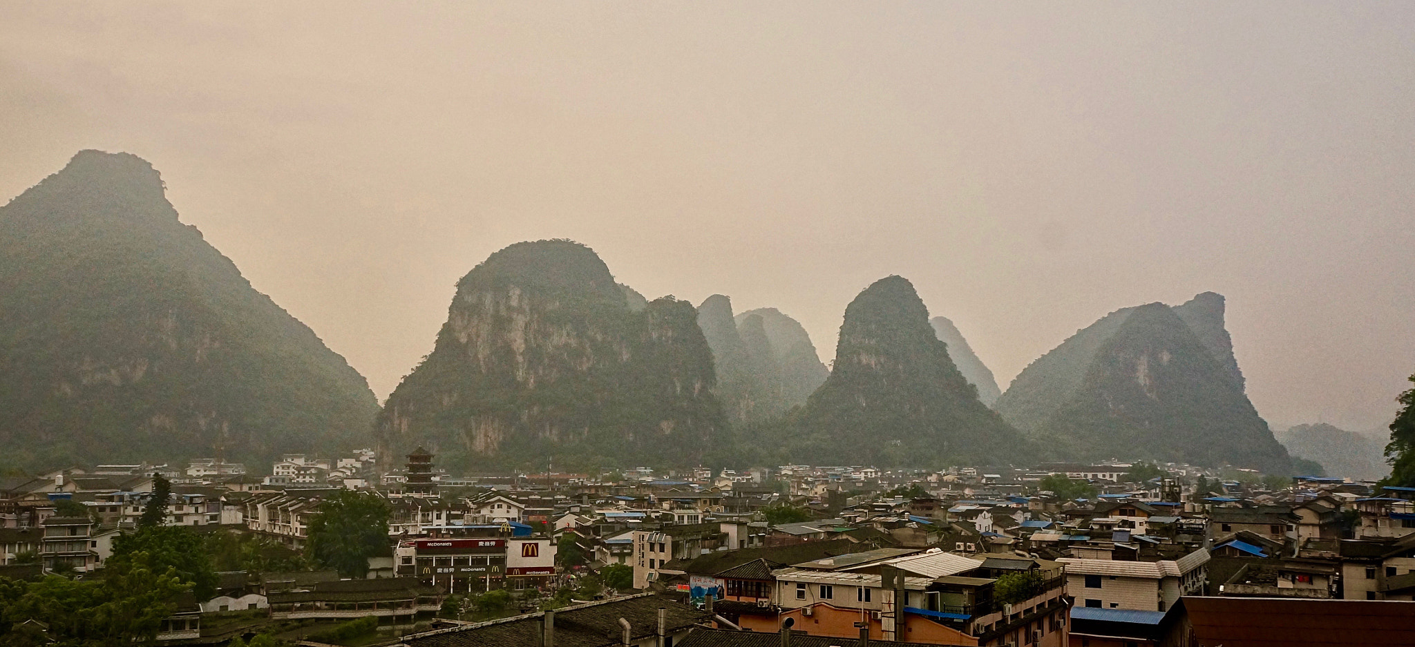 Sony Alpha NEX-5N sample photo. Yangshuo city before dark photography