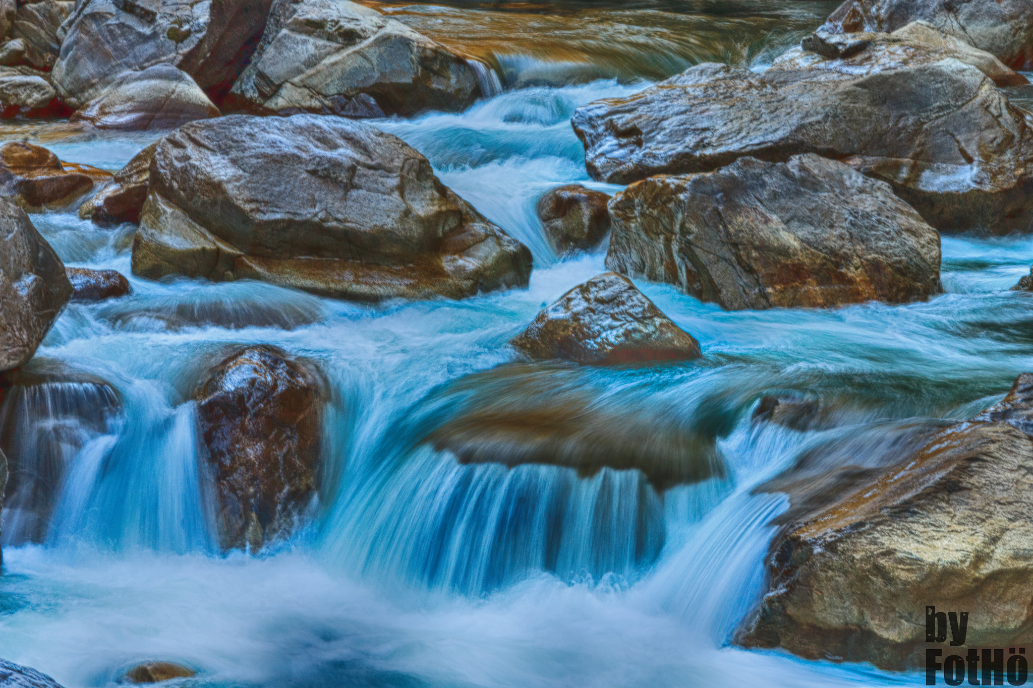 Sigma 18-250mm F3.5-6.3 DC OS HSM sample photo. Water and stones photography