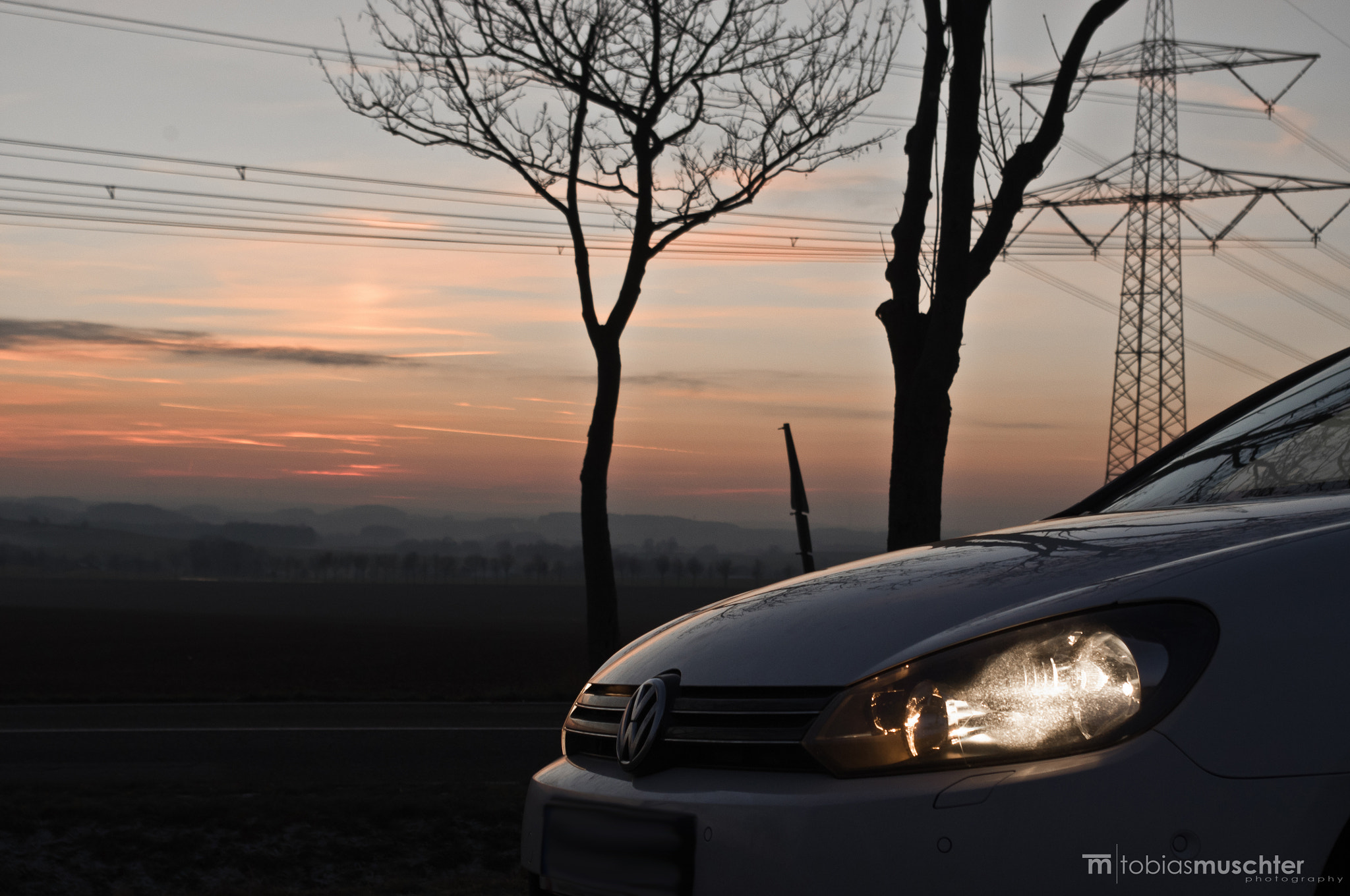 Pentax K-x sample photo. Vw golf sunset in winter photography