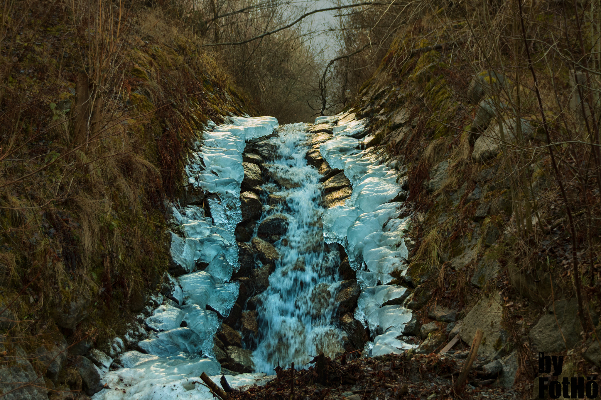 Sigma 18-250mm F3.5-6.3 DC OS HSM sample photo. Ice water and stones photography
