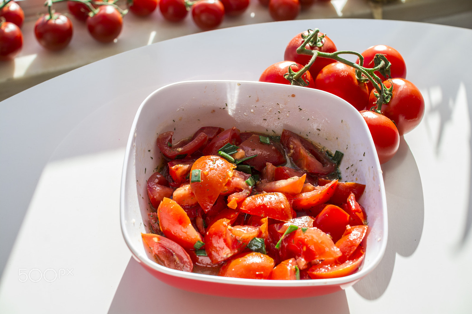 Nikon D7100 + Sigma 30mm F1.4 EX DC HSM sample photo. Red organic tomato on white photography