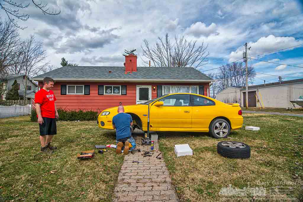Tokina AT-X Pro 12-24mm F4 (IF) DX sample photo. Front yard brake job photography