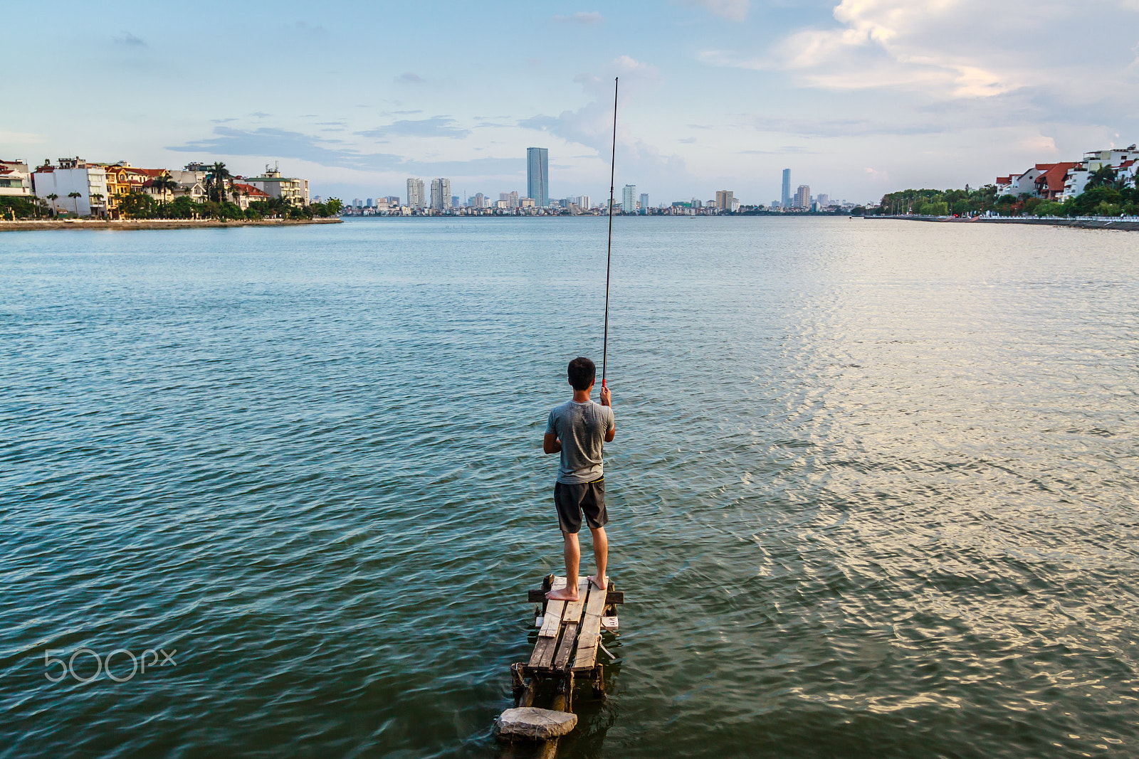 Canon EOS 50D + Canon EF 17-40mm F4L USM sample photo. Young men fishing on west lake photography